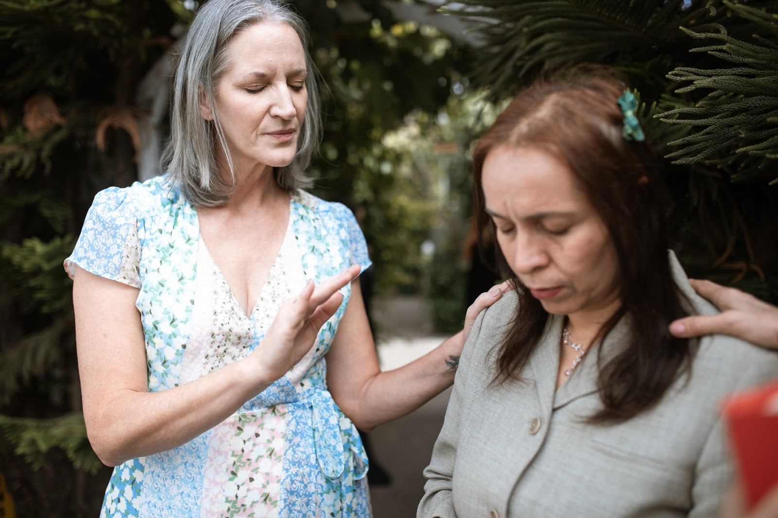 Woman being consoled