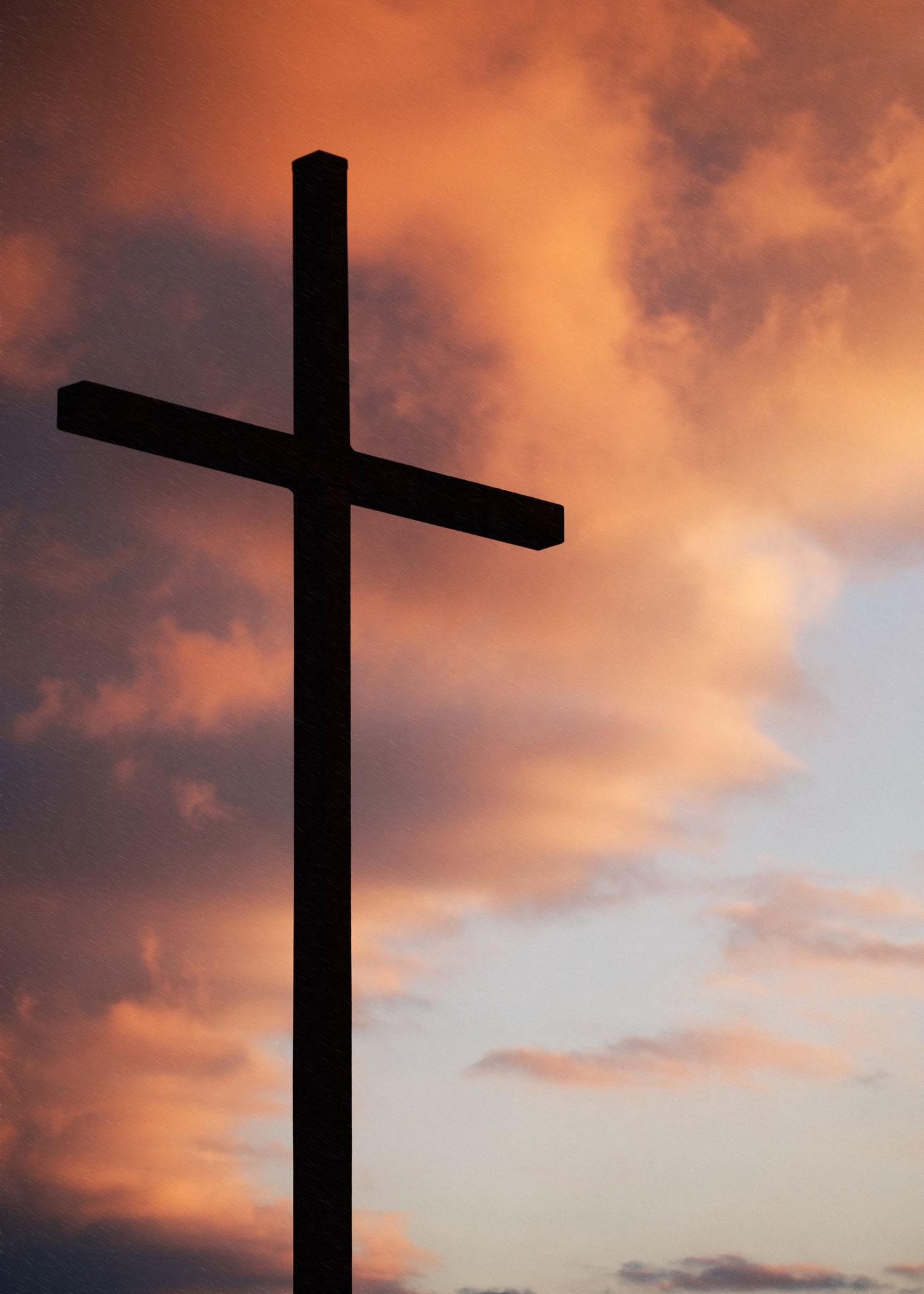 A cross against the morning sky