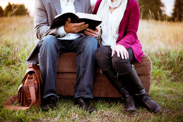 Couple reading Bible together