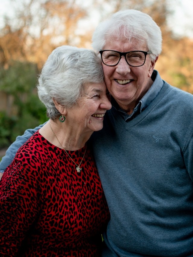 Senior couple hugging