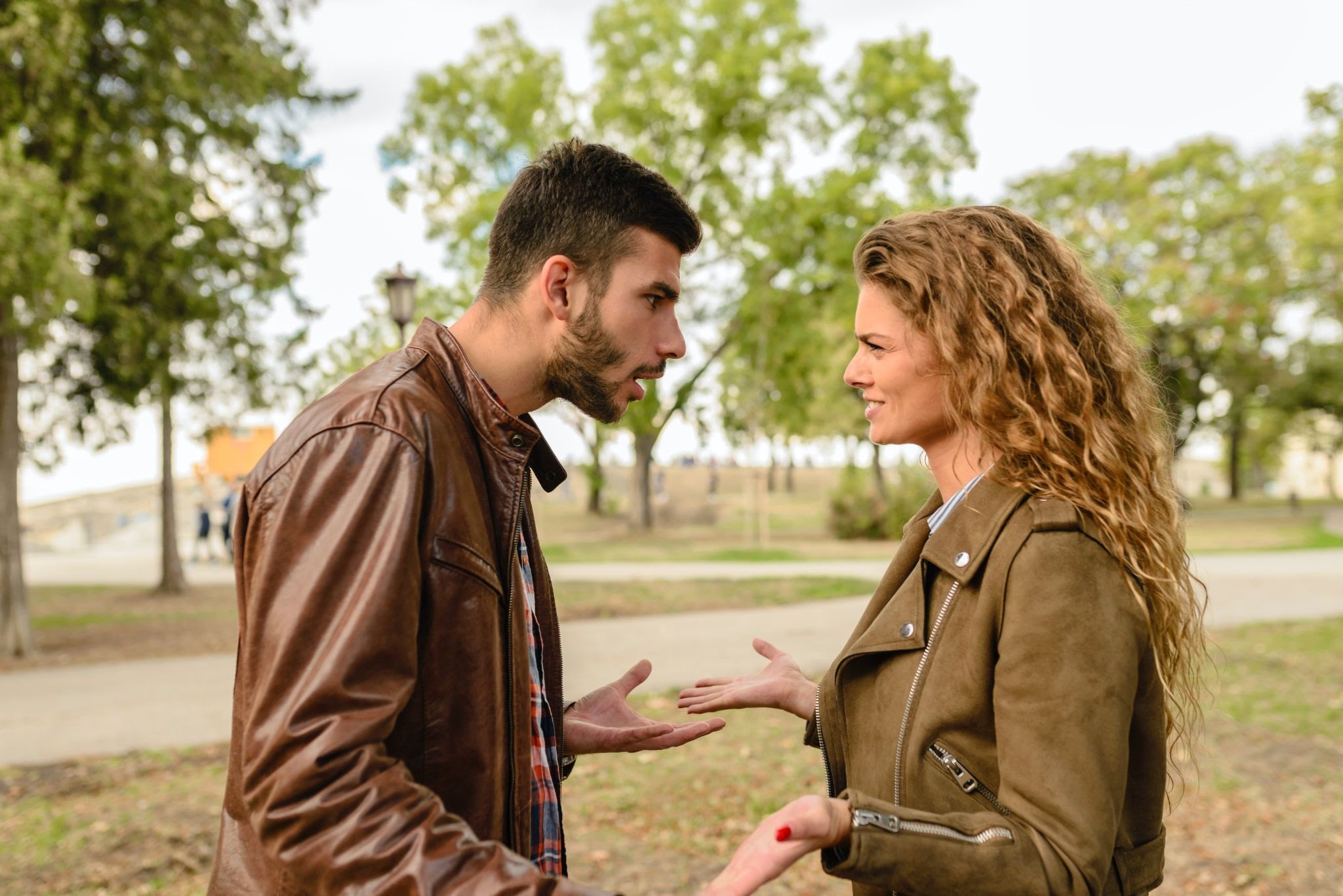 Man angrily shouting at woman