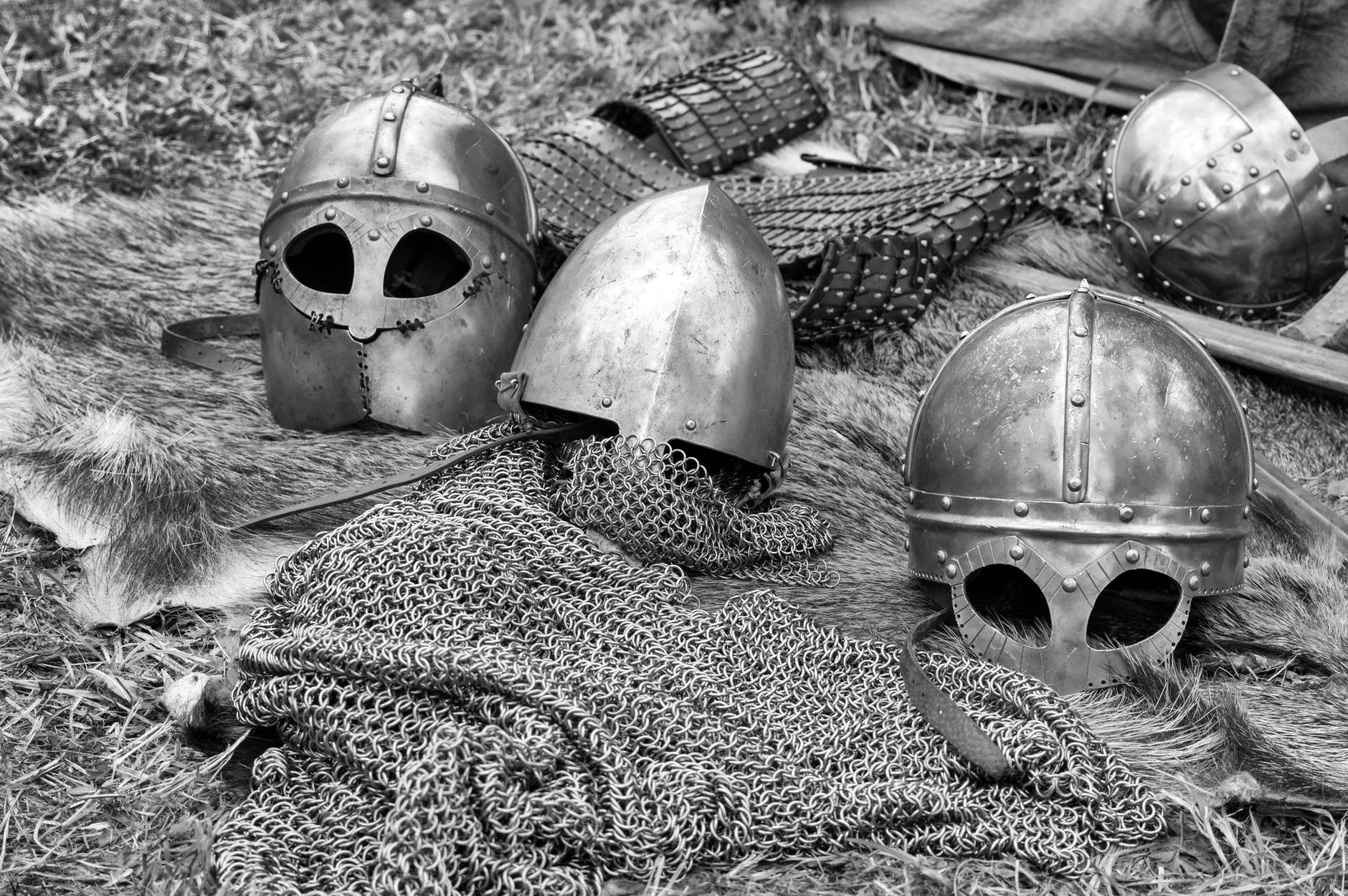 Solider helmets and chainmail on the ground
