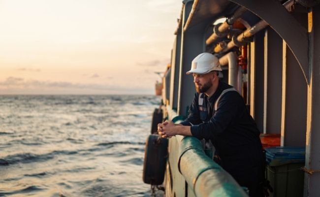 This image shows a Marine Deck Officer or Chief Mate on deck of offshore vessel or ship