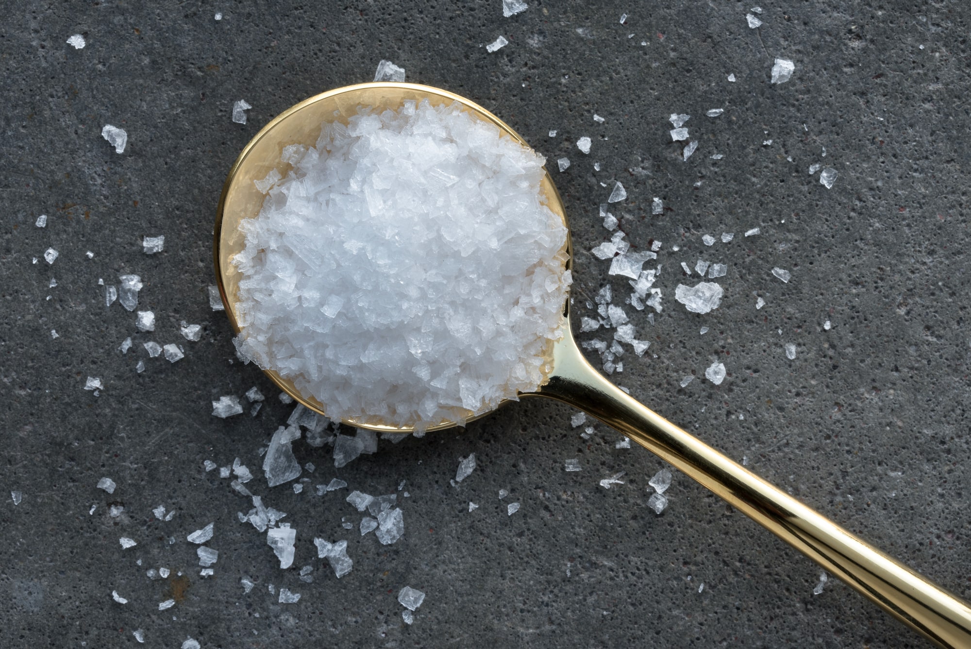 Sea salt flakes on a spoon