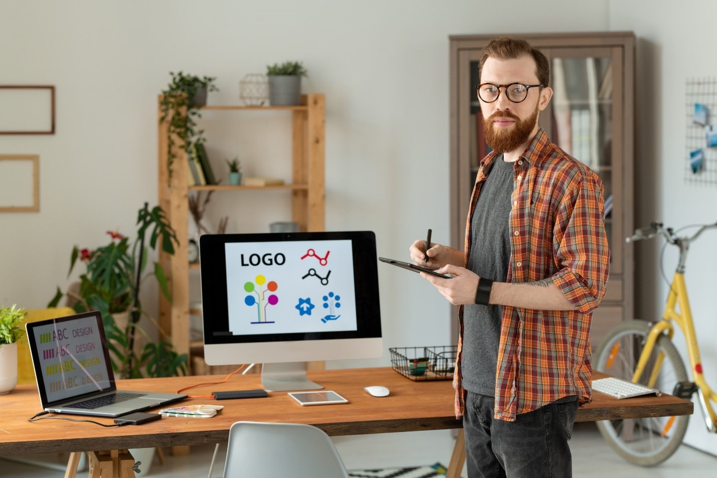 A designer working on branding in order to incorporate recommerce solutions.