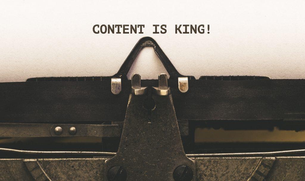 Typewriter that states that content is king.