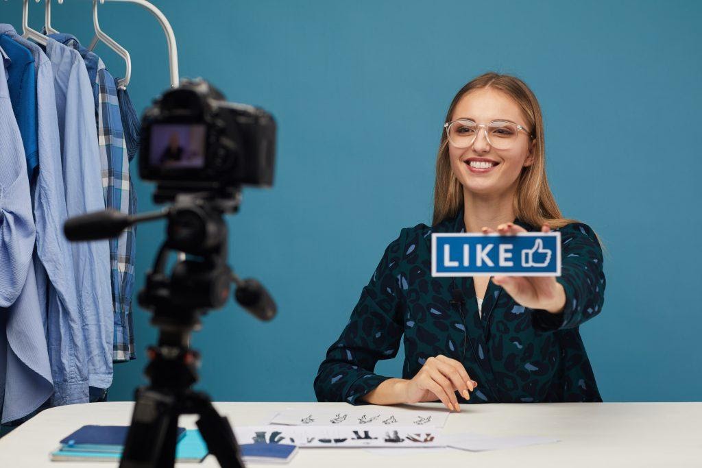 A girl creating video content, showing what you need to consider in order to create the right content for your target audience.