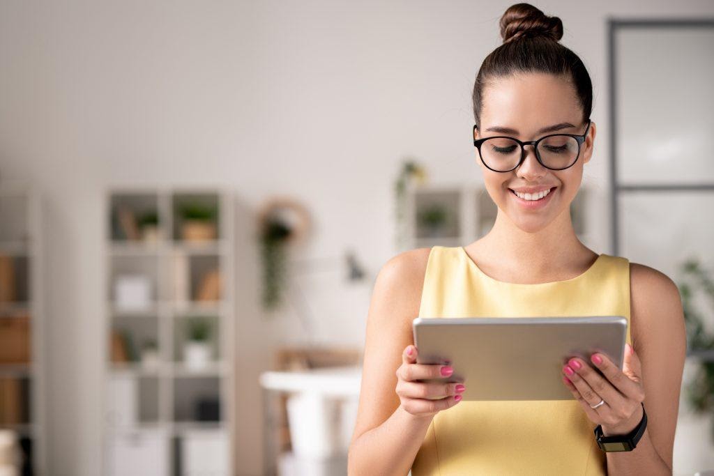 A girl viewing story content on a tablet PC.