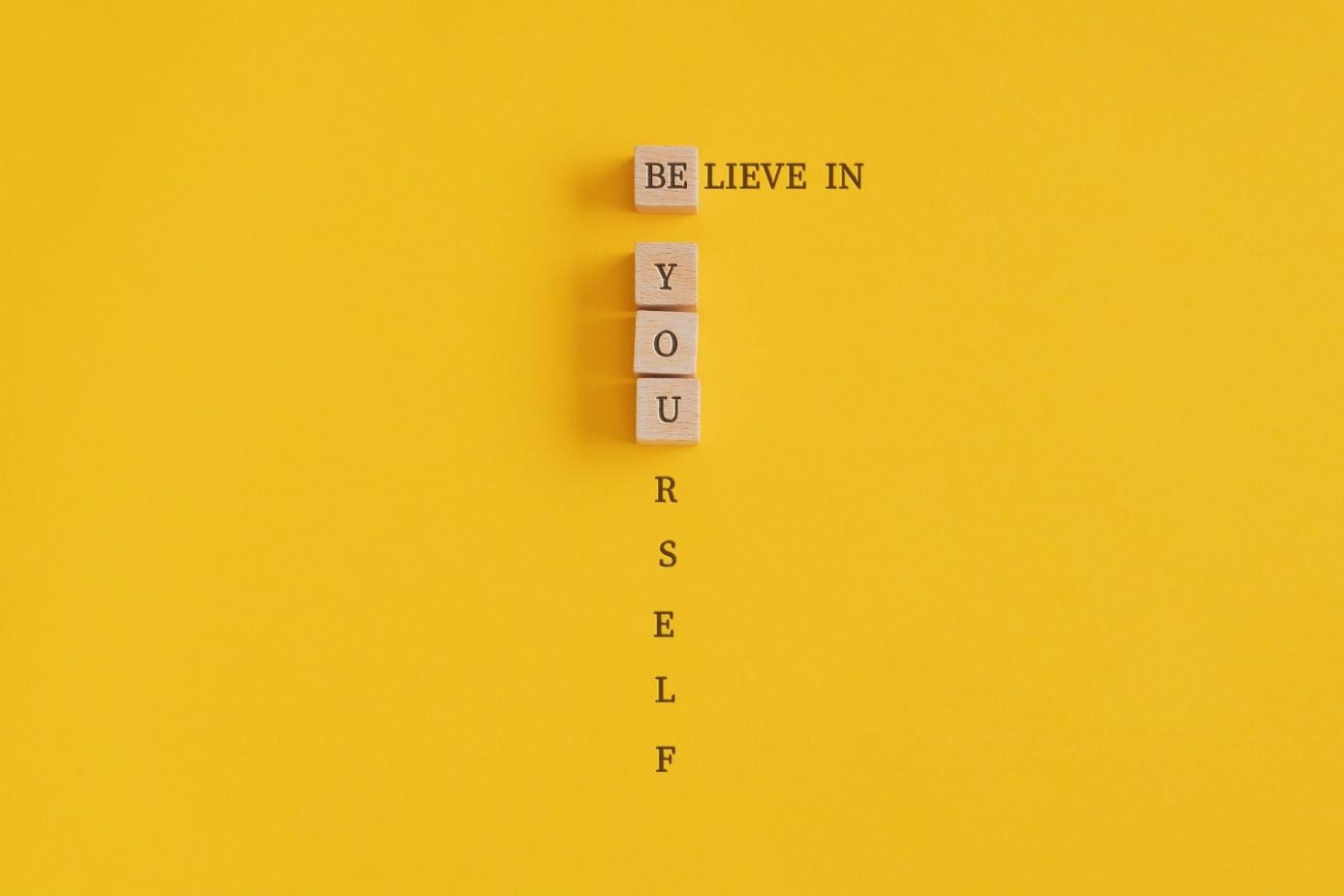 Letter blocks and letters used to create a clever visual message, showing one of the benefits of visual marketing.