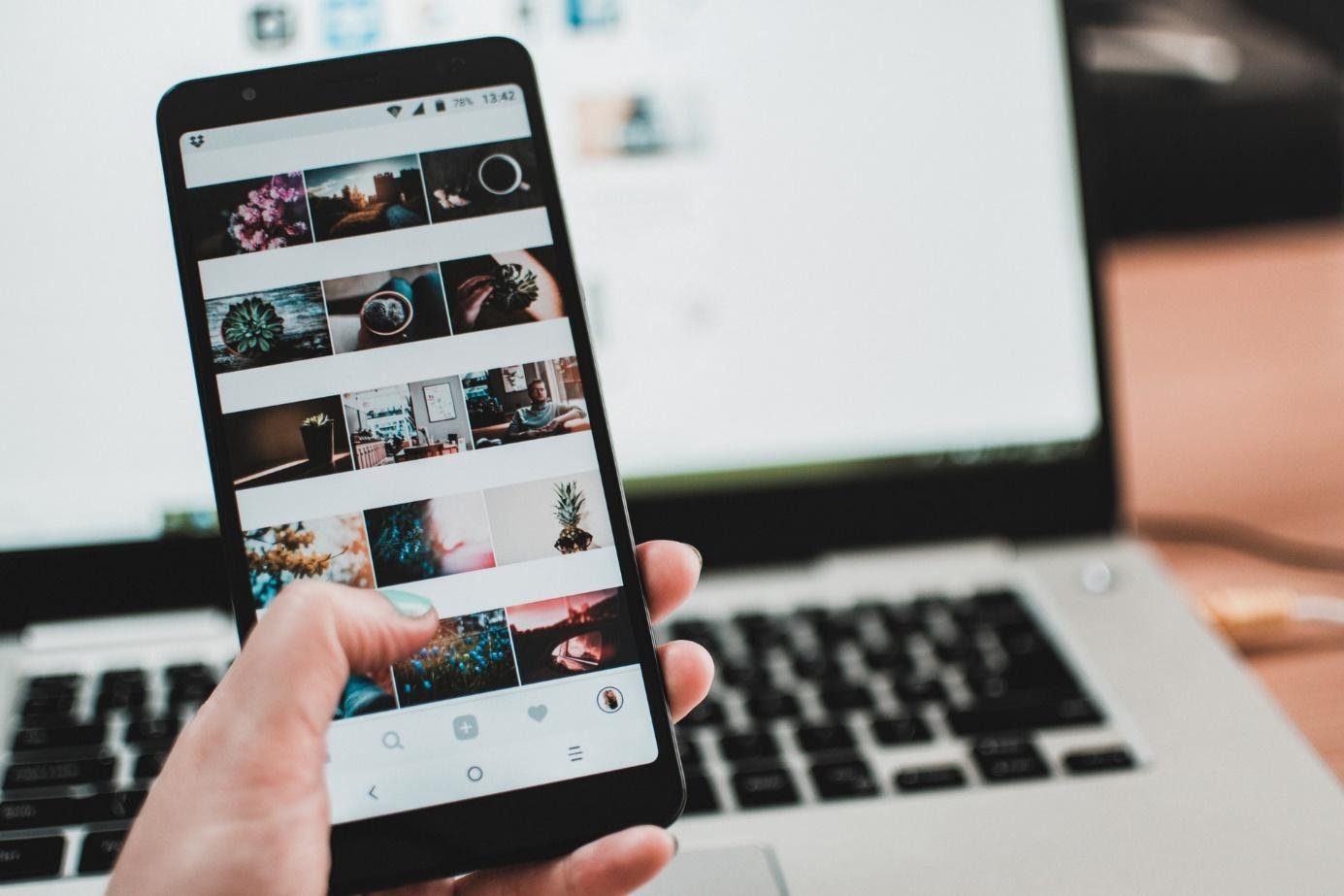 A person using Instagram on their phone.