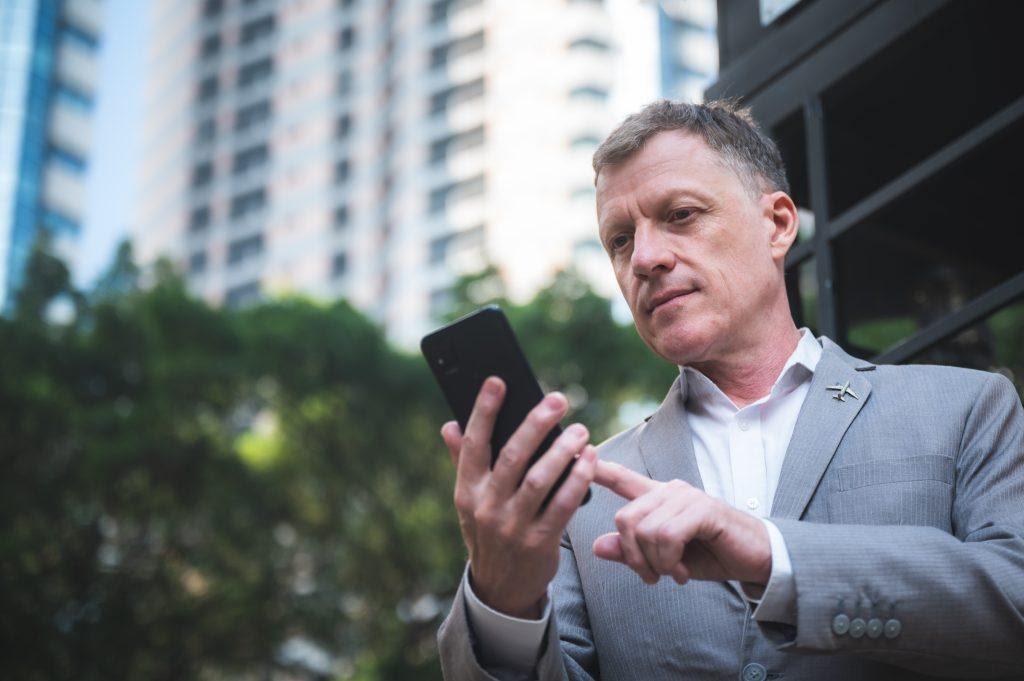 A person using a phone.