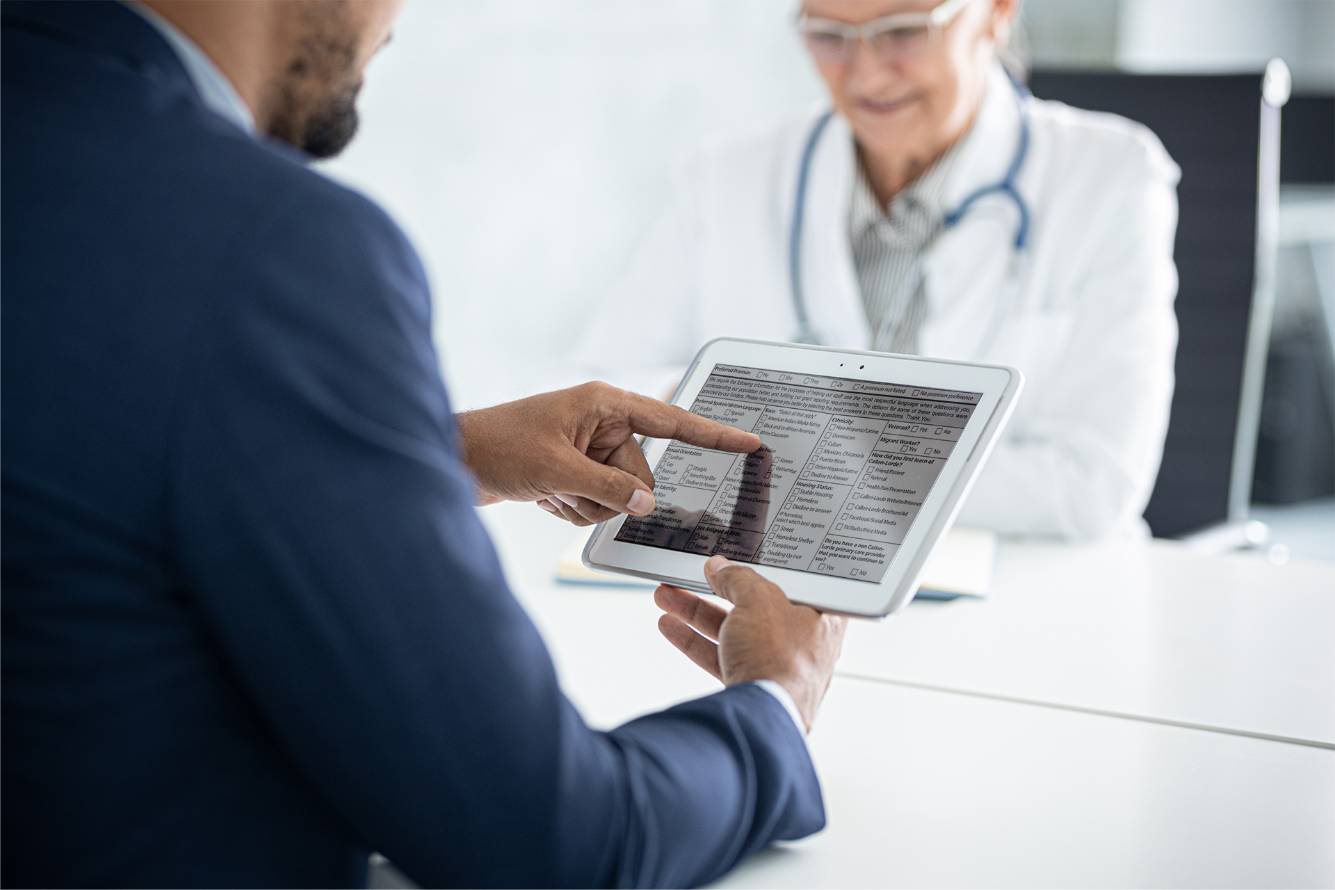 A man entering in their SDoH information.