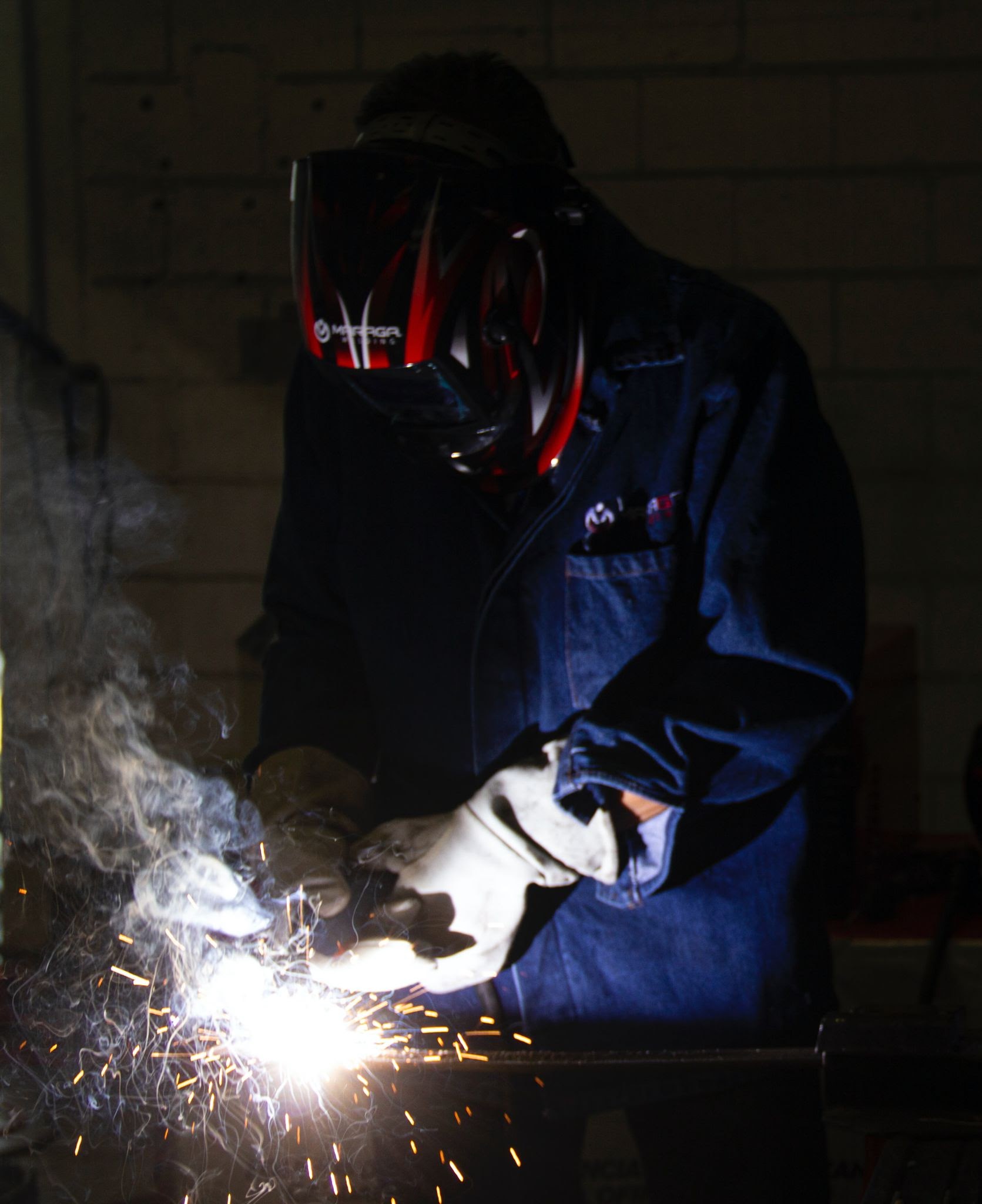 man using fabrication tool