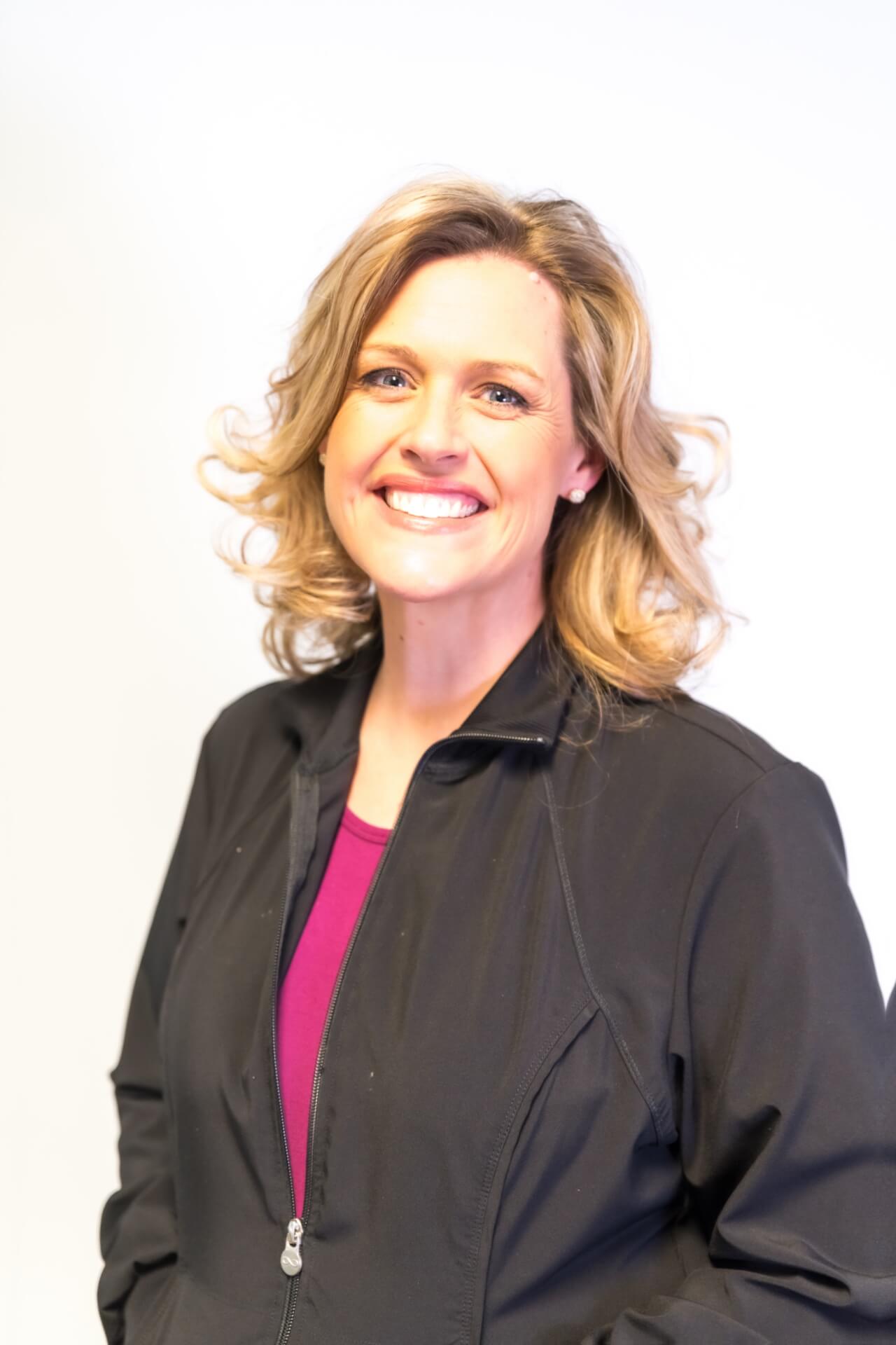 Stacey helps educate patients about their teeth cleaning and gum health