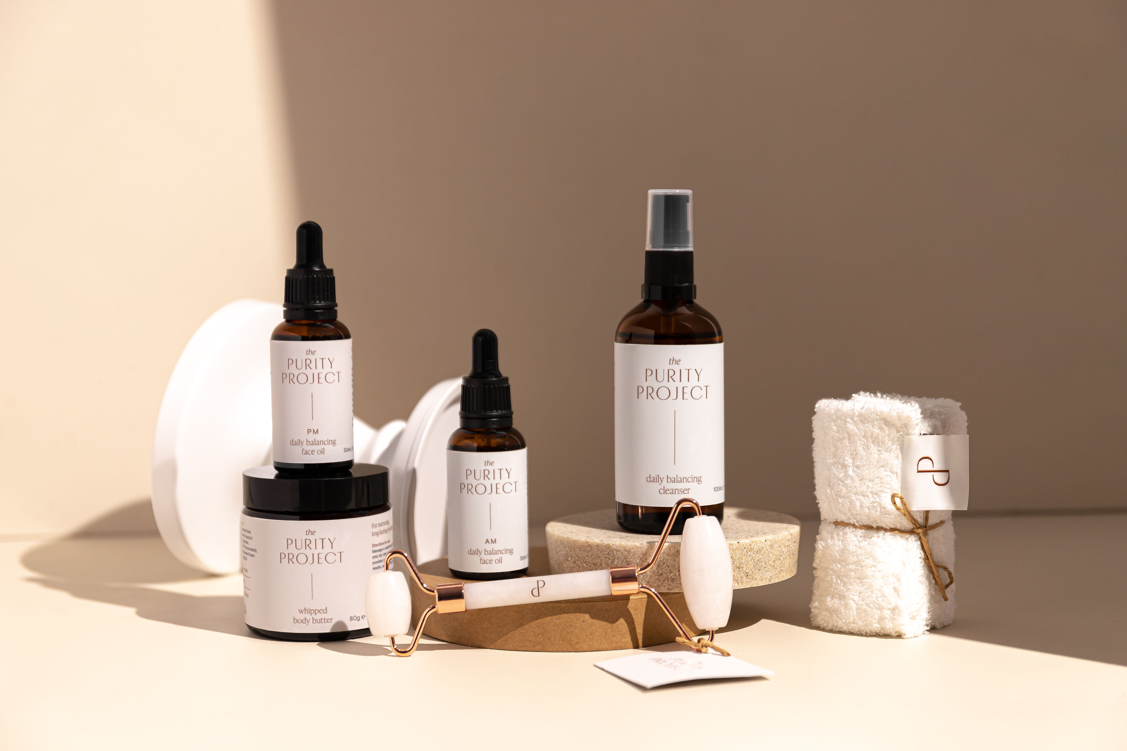 The Daily Balancing Luxe Bundle pictured against a decorative background.