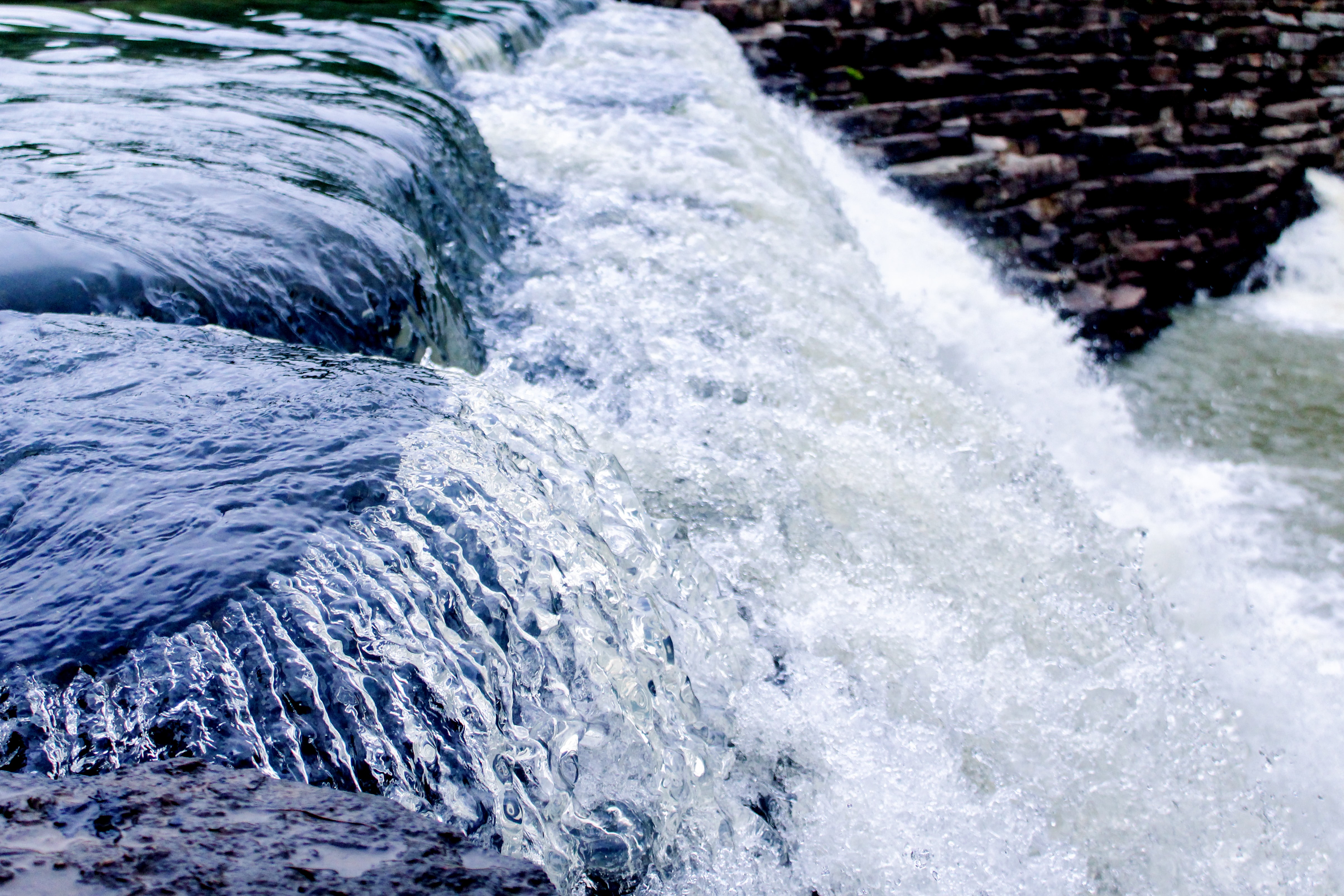 An abstract image of power: a strong, flowing current of water.