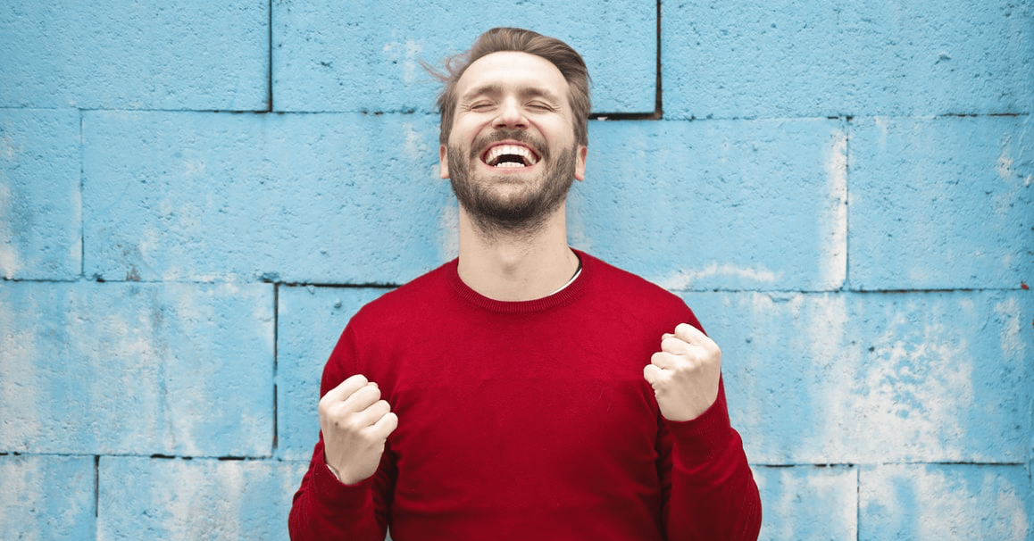 A celebrating software developer