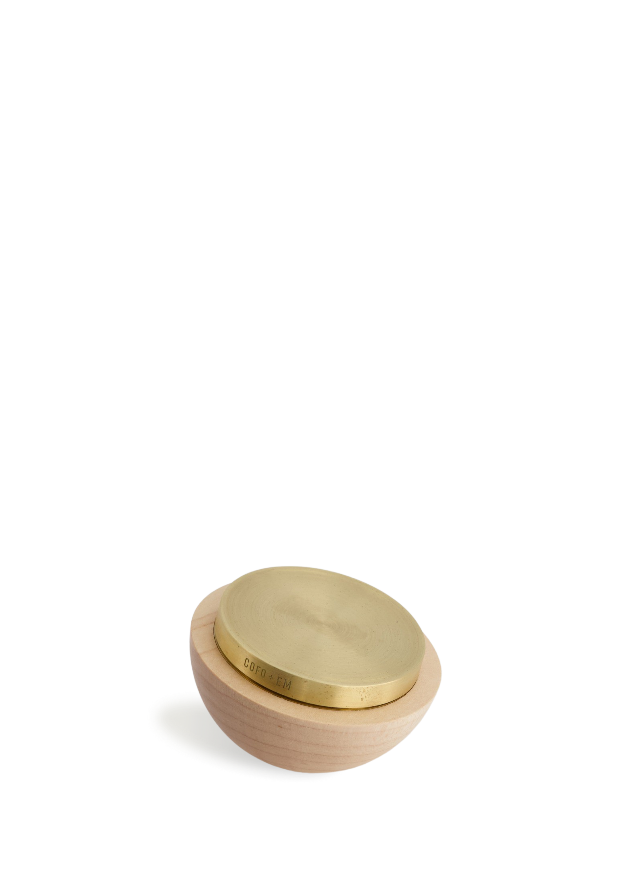 Made with solid brass and Canadian maple wood, the Wobble Grinder by Cofo & Ellie Mae serves as a functional yet entertaining object for stylish grinding. The hand polish finish and wobbling energy will make this rolling staple an object you won't want to put down. Made for a special collaboration with sustainable Canadian fashion brand, Ellie Mae, this grinder was ethically made in Toronto. With the artful hand-polished finish on the Canadian wood and brass, it is a true piece of fine craftsmanship. Once you give it a spin, you'll know what we mean!