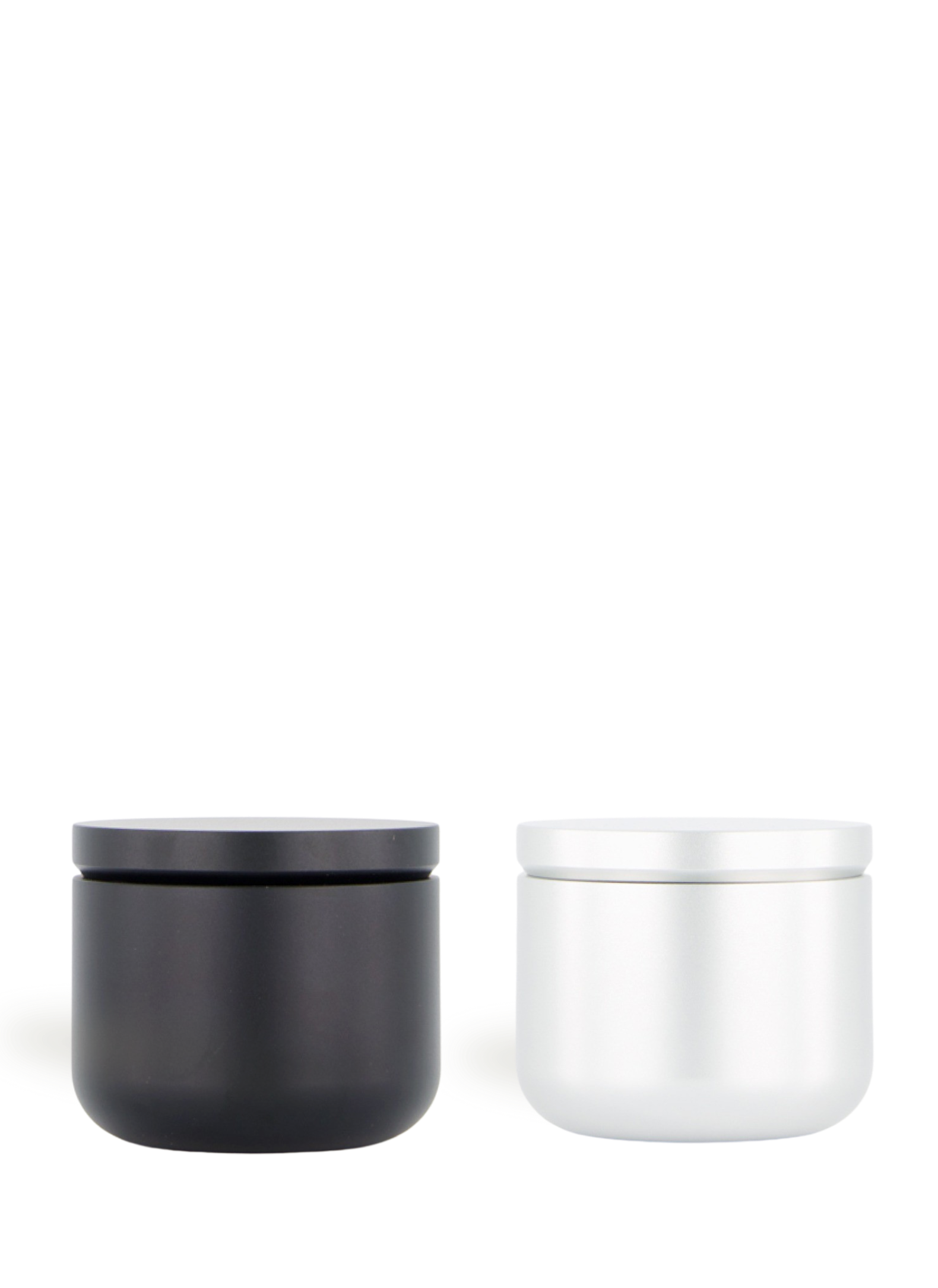 This airtight container by Craighill is a perfect hiding place for sacred plants and little treasures. Made from Anodized aluminum, it features a secure seal thanks to a silicon ring. Craighill's functional minimalism shines through the matte texture of these black and silver stash jars.