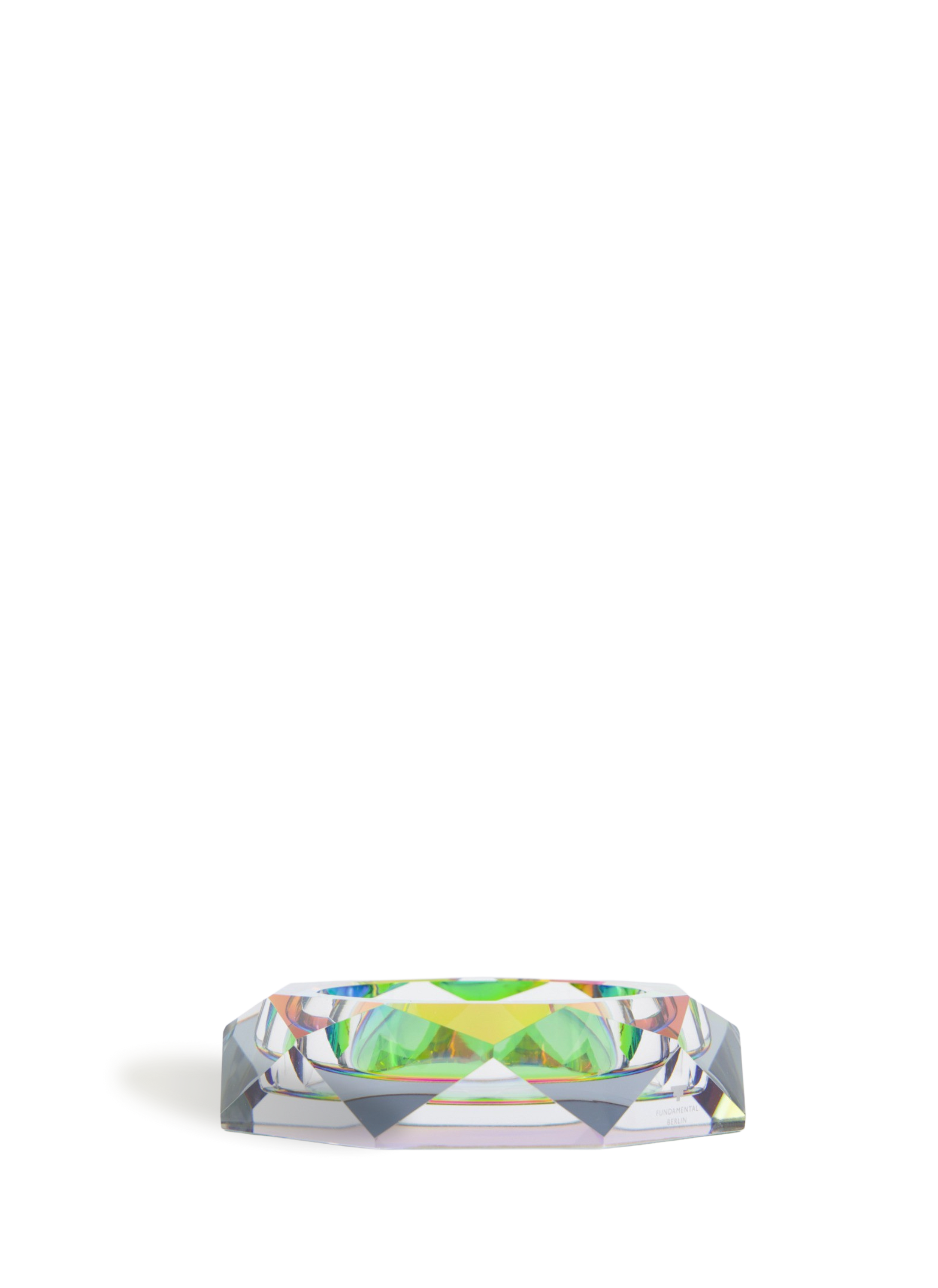 Bring a rainbow into your home! The Regenbogen series is handmade from heavy crystal. Treated with a special chromatic film on the underside, the Fundamental Berlin design exaggerates and distorts crystal’s natural ability to break light into the seven rainbow colours. This substantial bowl is an eye-catching centrepiece for a coffee or display shelf.