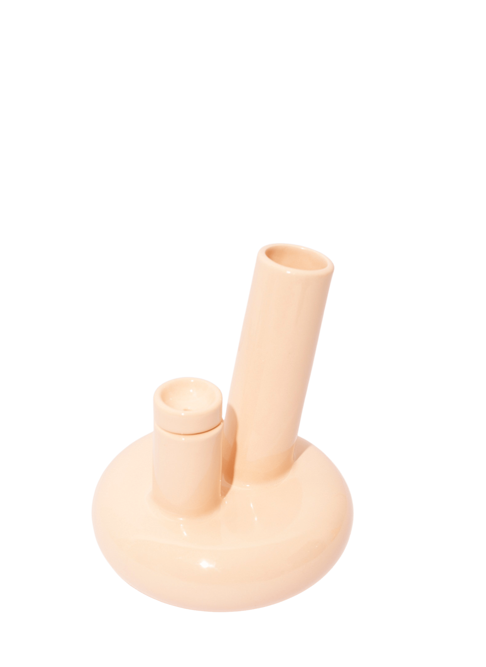 The MC001 bong by Weed'd is an Italian masterpiece by designer Maddalena Casadei. She dove deep into the ritual of water pipes to revisit the softness of the bong experience. This designer bong brings pure tactile pleasure with every hit. The MC001 water pipe is available in 3 saturated colors in glazed ceramic. This bong is handmade in Milan using artisanal practices. The Weed'd water pipes are limited releases with only 50 per color in the world.