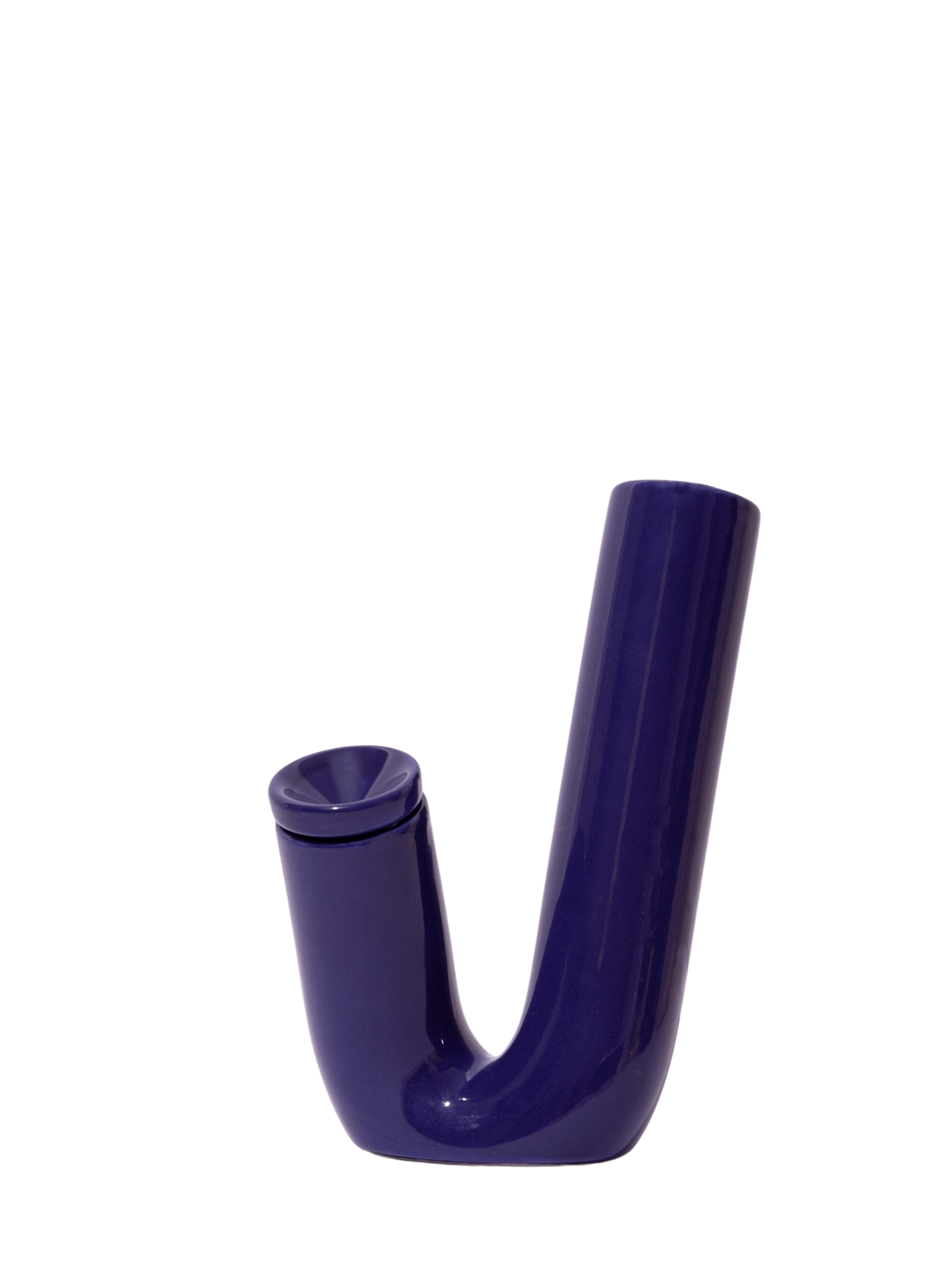 The SB001 bong by Weed'd is an Italian masterpiece by designer Valerio Sommella. Revisiting the physical representation of the bong, a pipe, and bent tube becomes a communicating vessel. The VS001 water pipe is available in 3 saturated colors in glazed ceramic. This bong is handmade in Milan using artisanal practices. The Weed'd water pipes are limited releases with only 50 per color in the world.