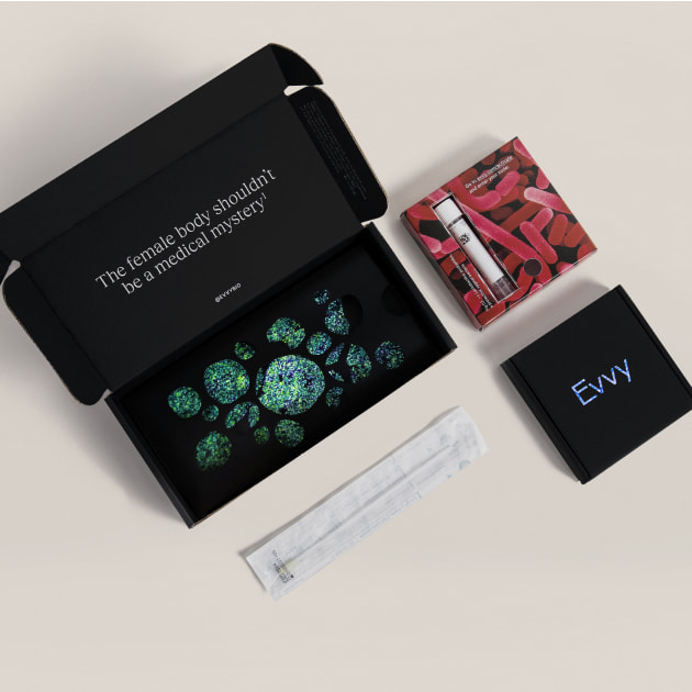 A flat lay of the contents of the Evvy Vaginal Health Check