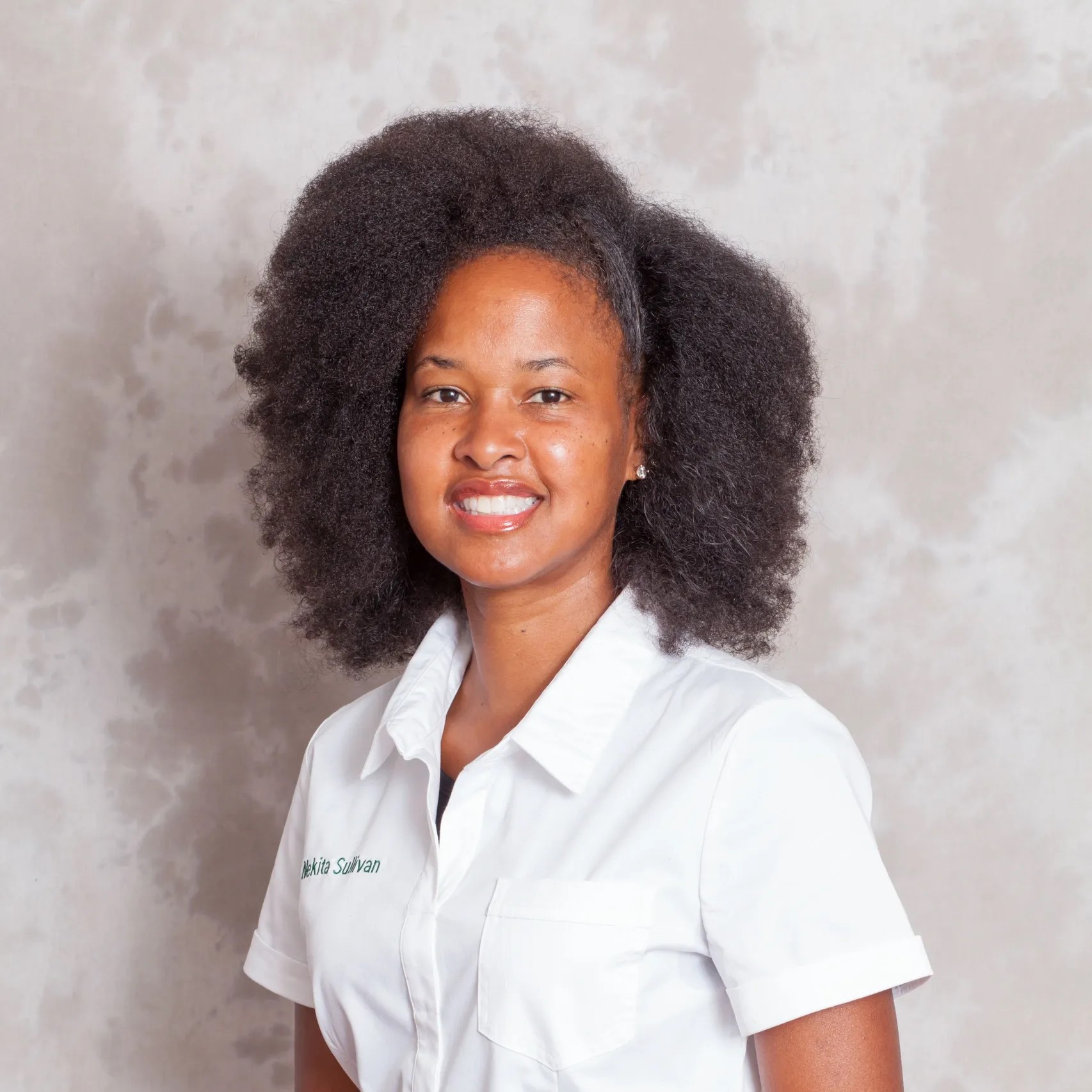 A photo of Dr. Nekita Sullivan, owner of Yoga Therapy Bar