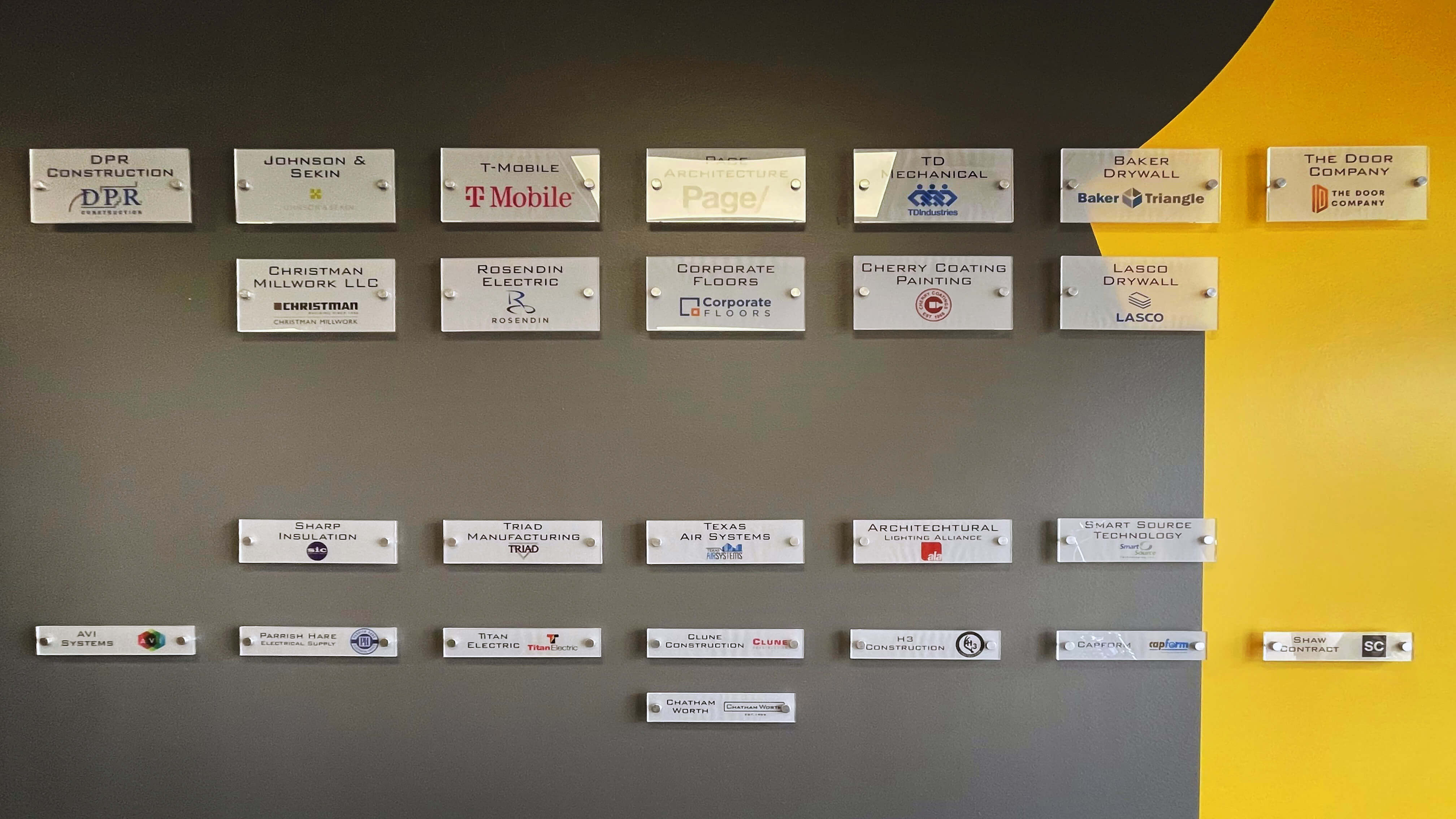 Donor plaques on One Tribe Foundation wall