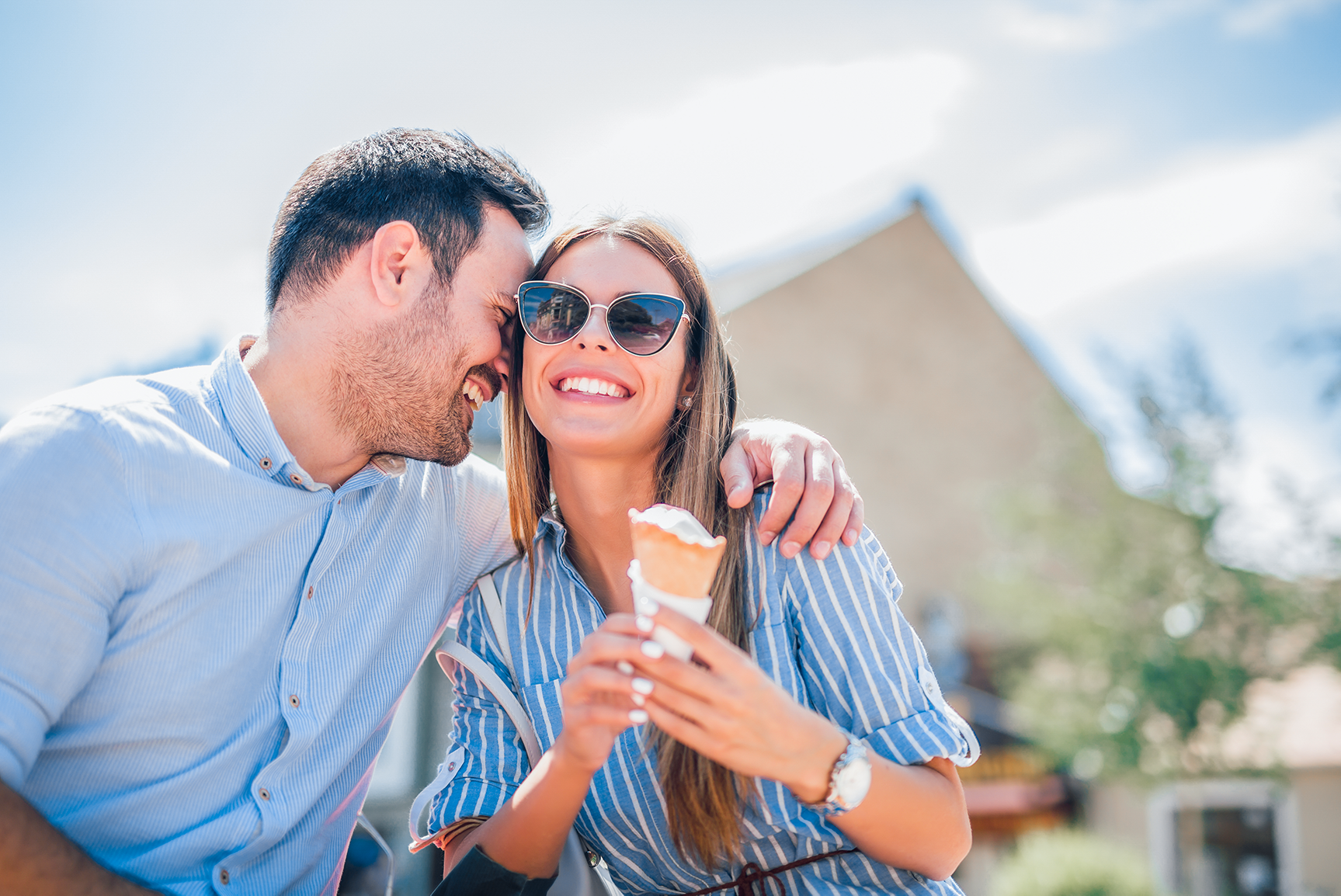 happy couple eating icecream