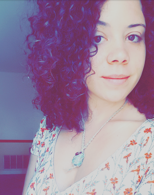 Picture of website's owner and designer, Summer, wearing a cute sundress and macramé necklace.