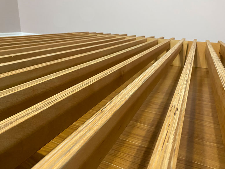 Close up of a Quagga Designs Tic Tac Toe Bed Frame