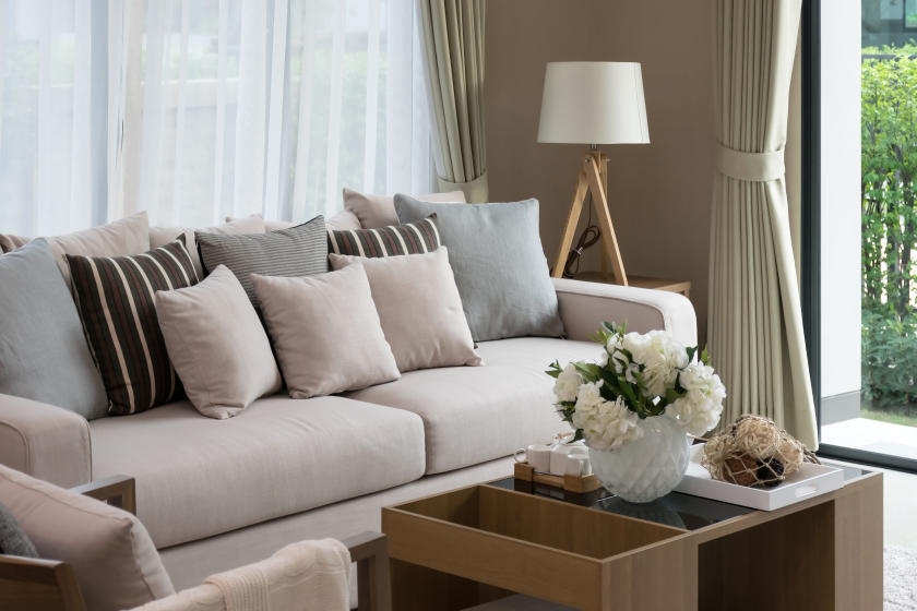 Plush living room with brown beige walls
