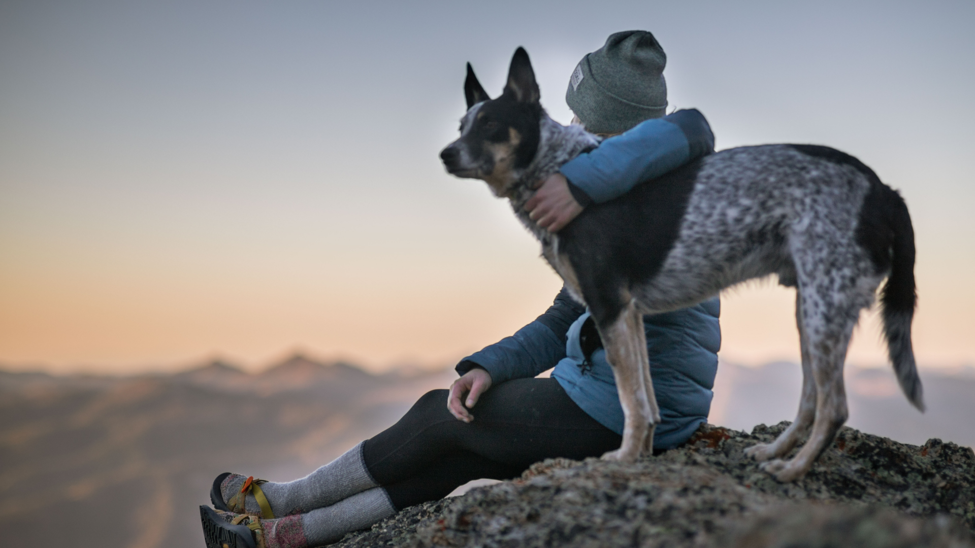 woman hiking with ESA dog