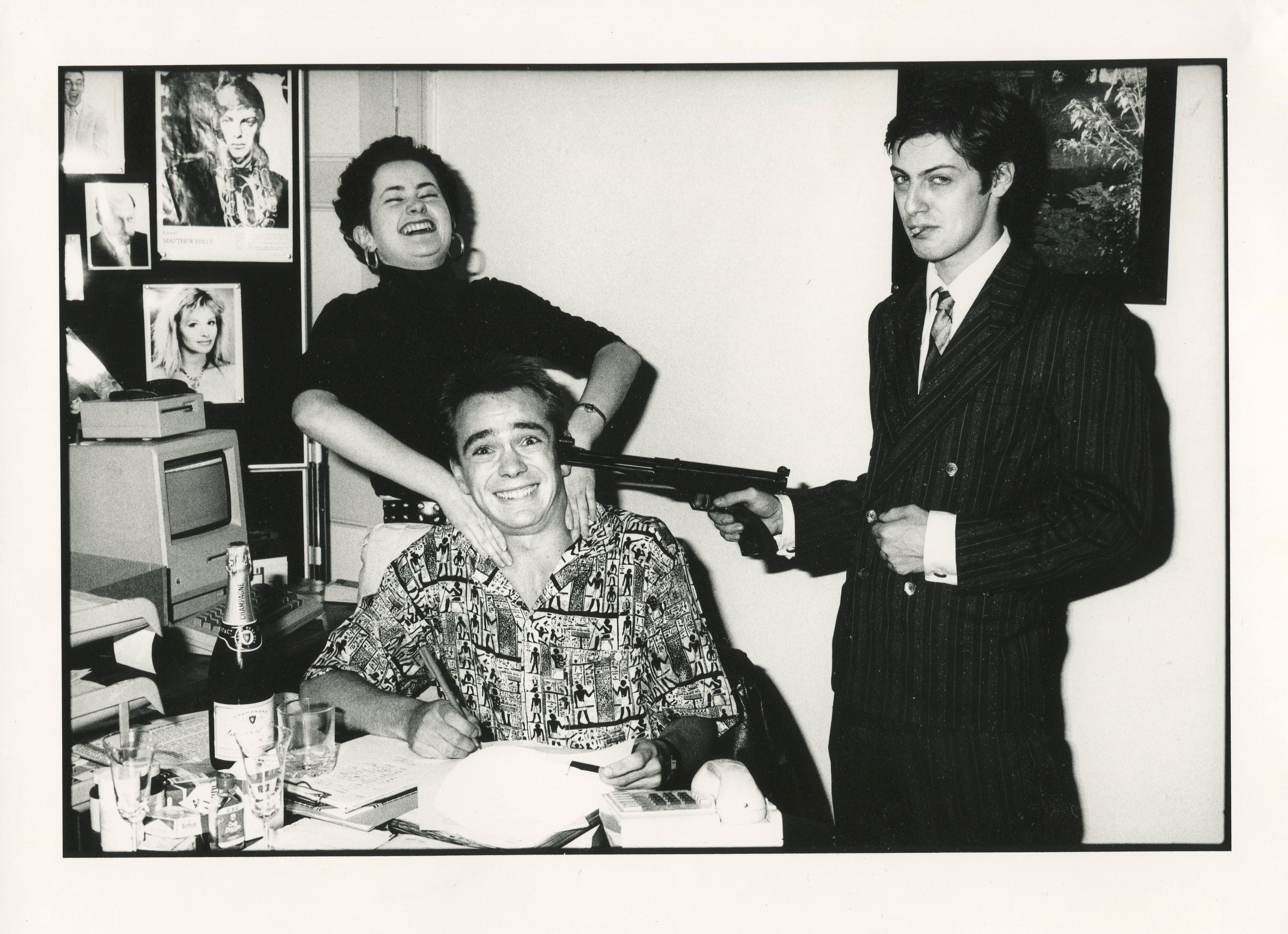 Les Bubb signing his first contract in the 1980s with Matthew Freud
