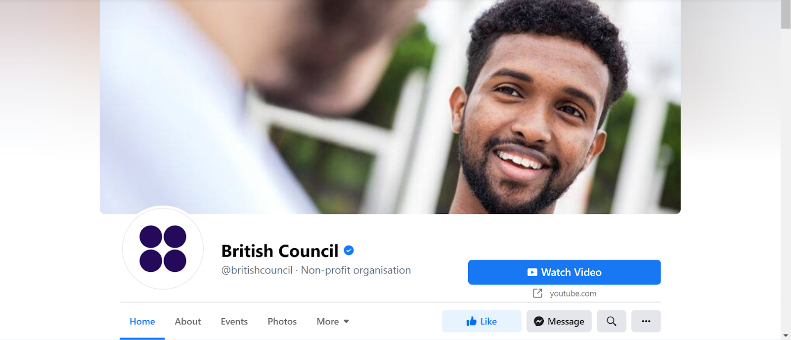 Screenshot of British Council Facebook page with image of a man talking to another man in a shirt and smiling