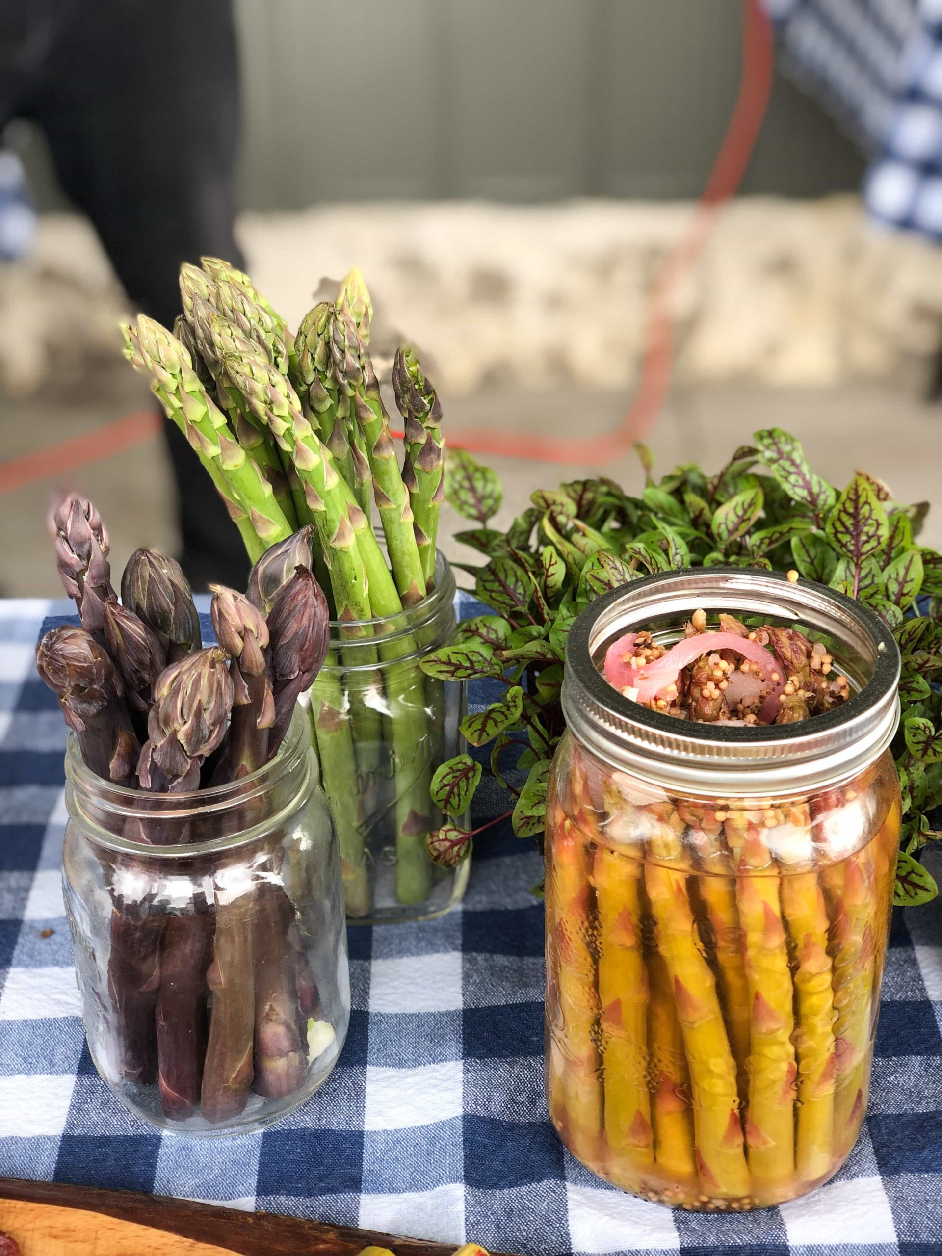 asparagus spears in mason jars