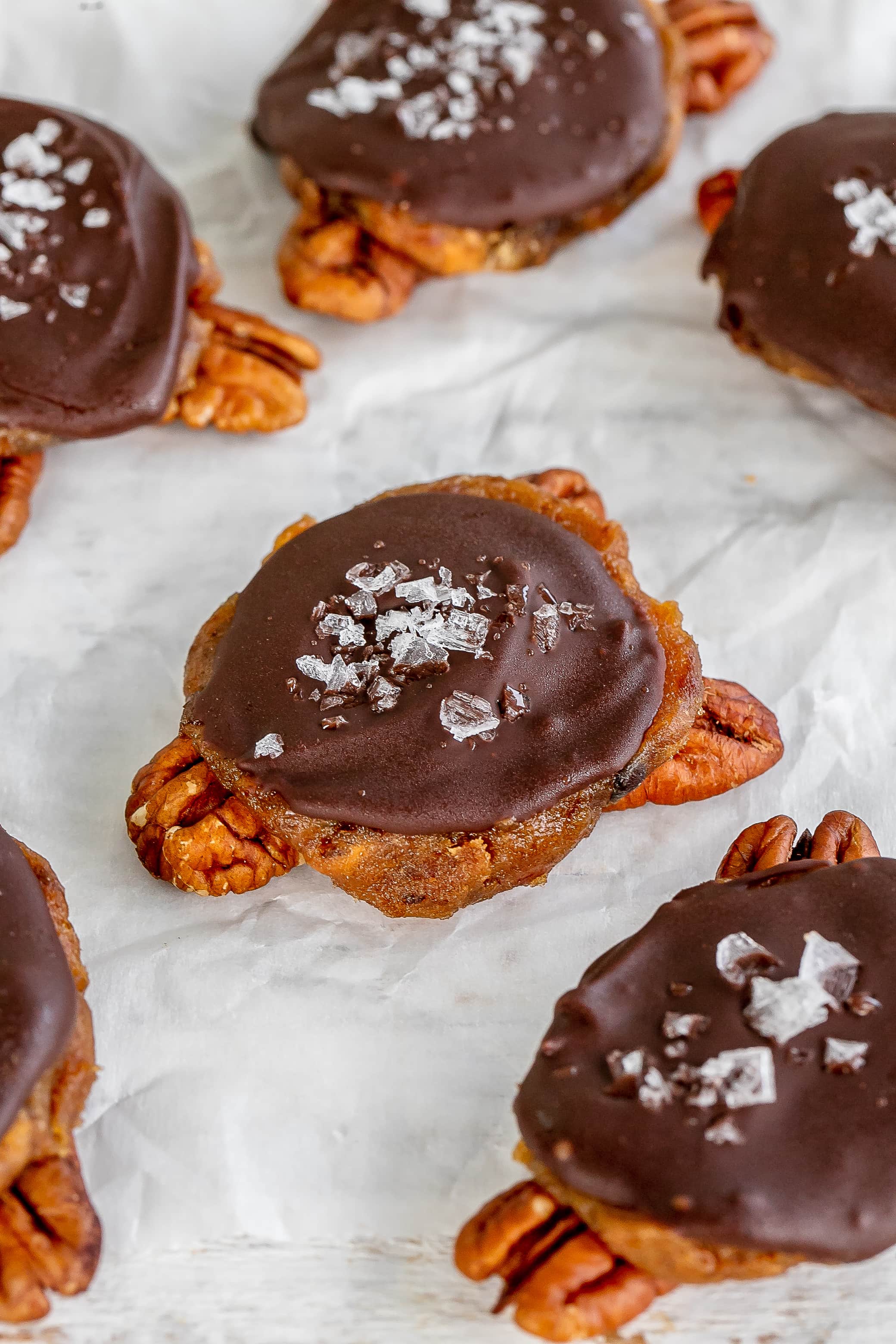 vegan chocolate turtles on parchment paper
