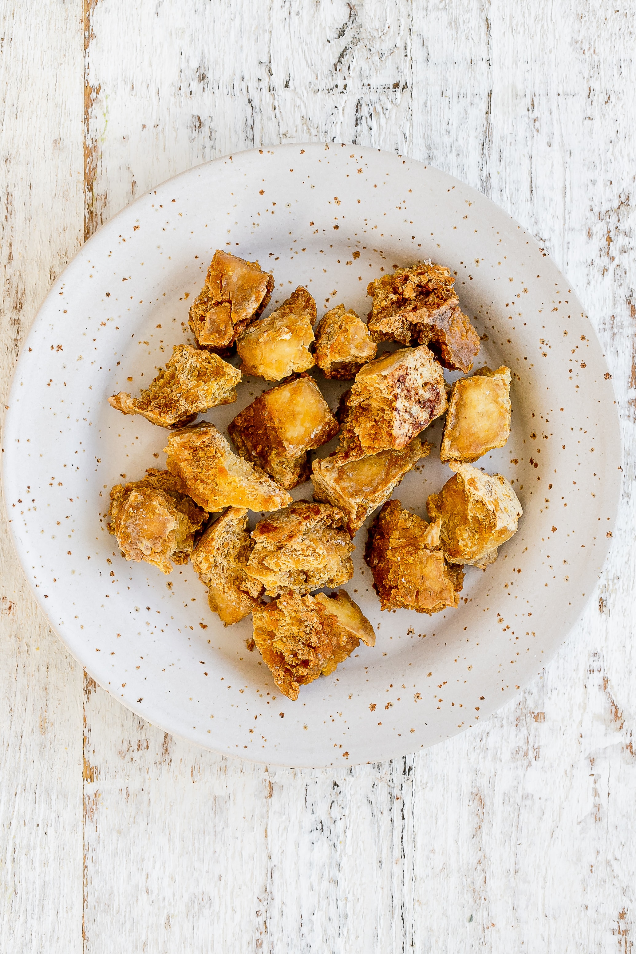crispy tofu croutons on plate