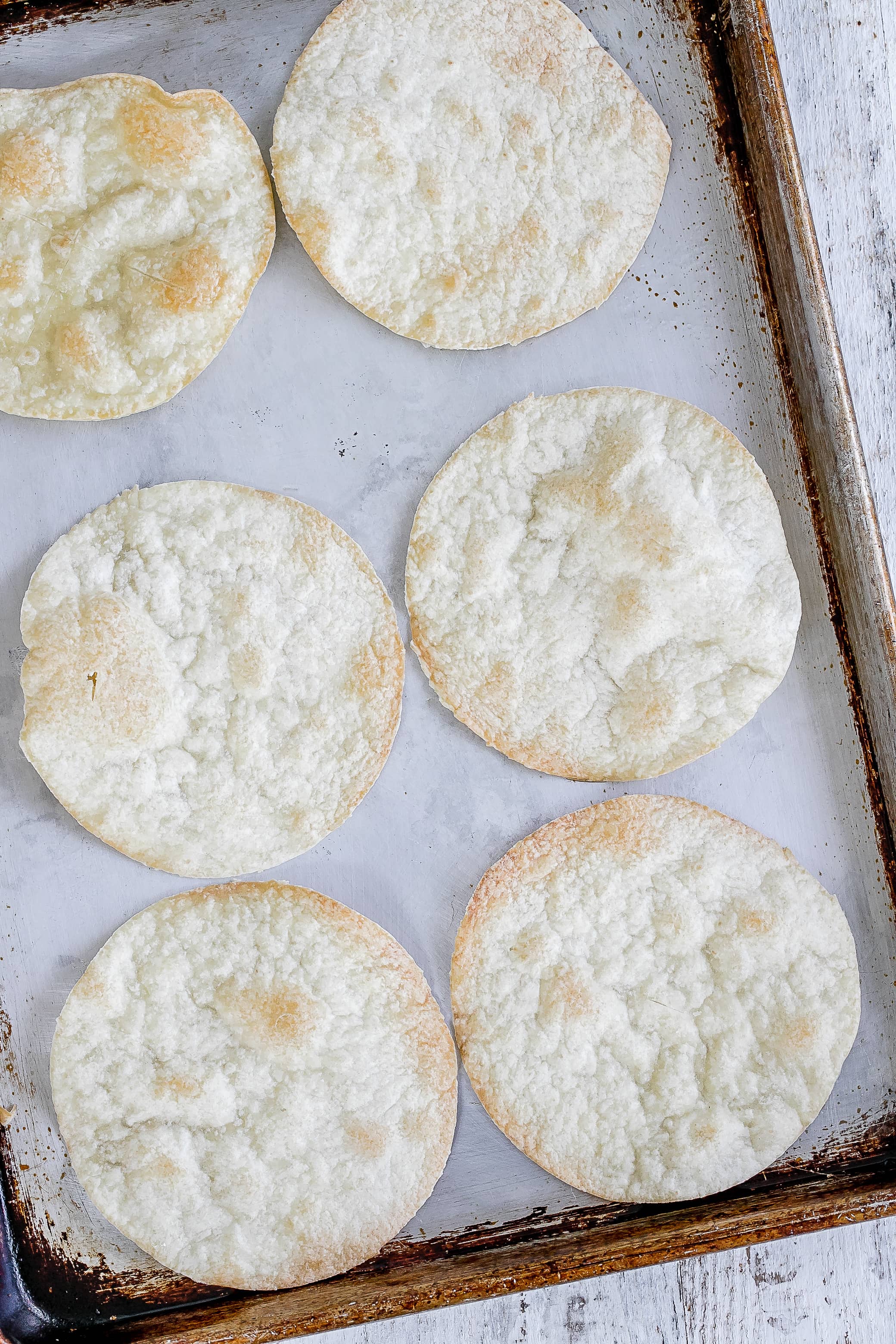 tostadas on baking sheet out from the oven.