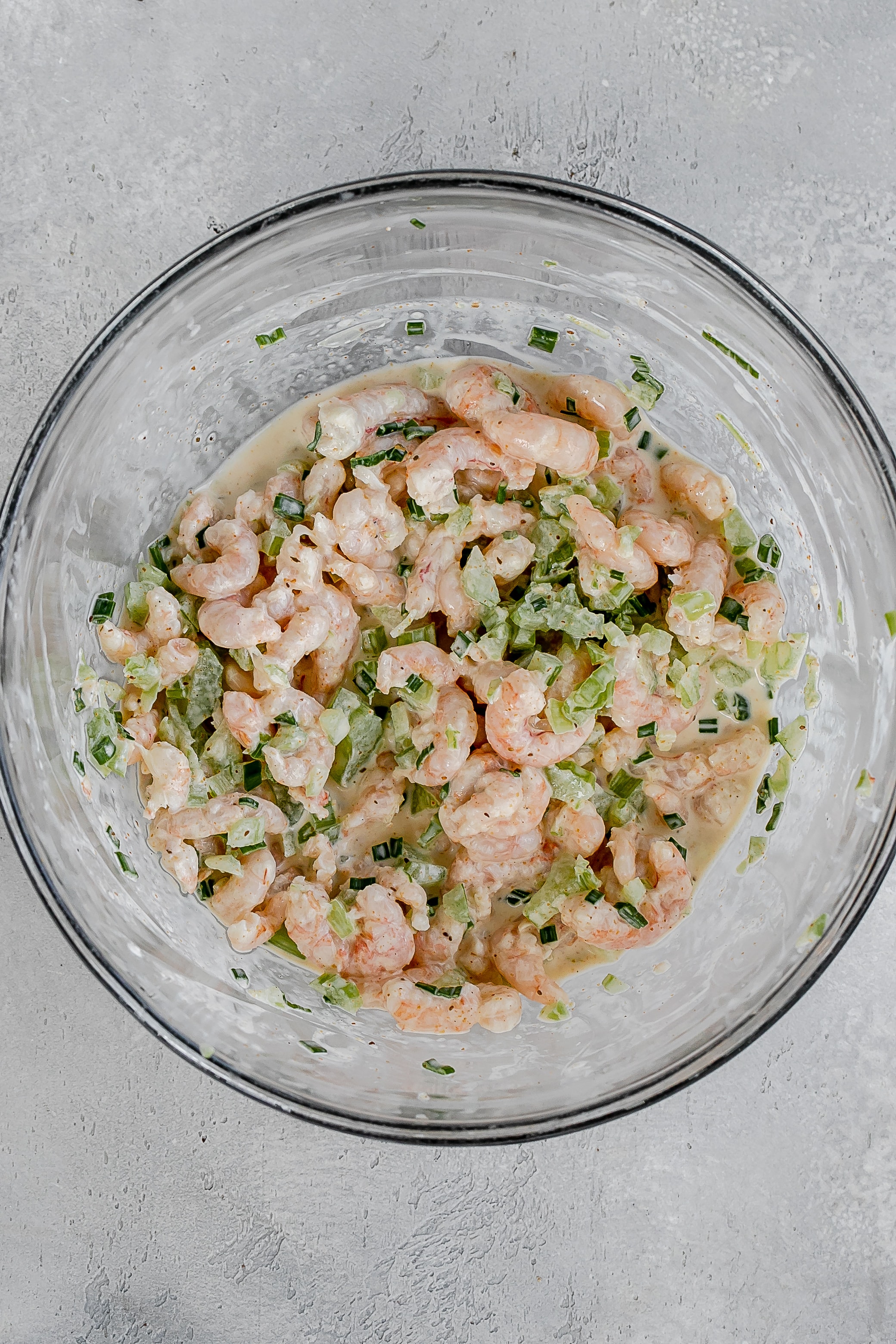 shrimp salad mixed in bowl.