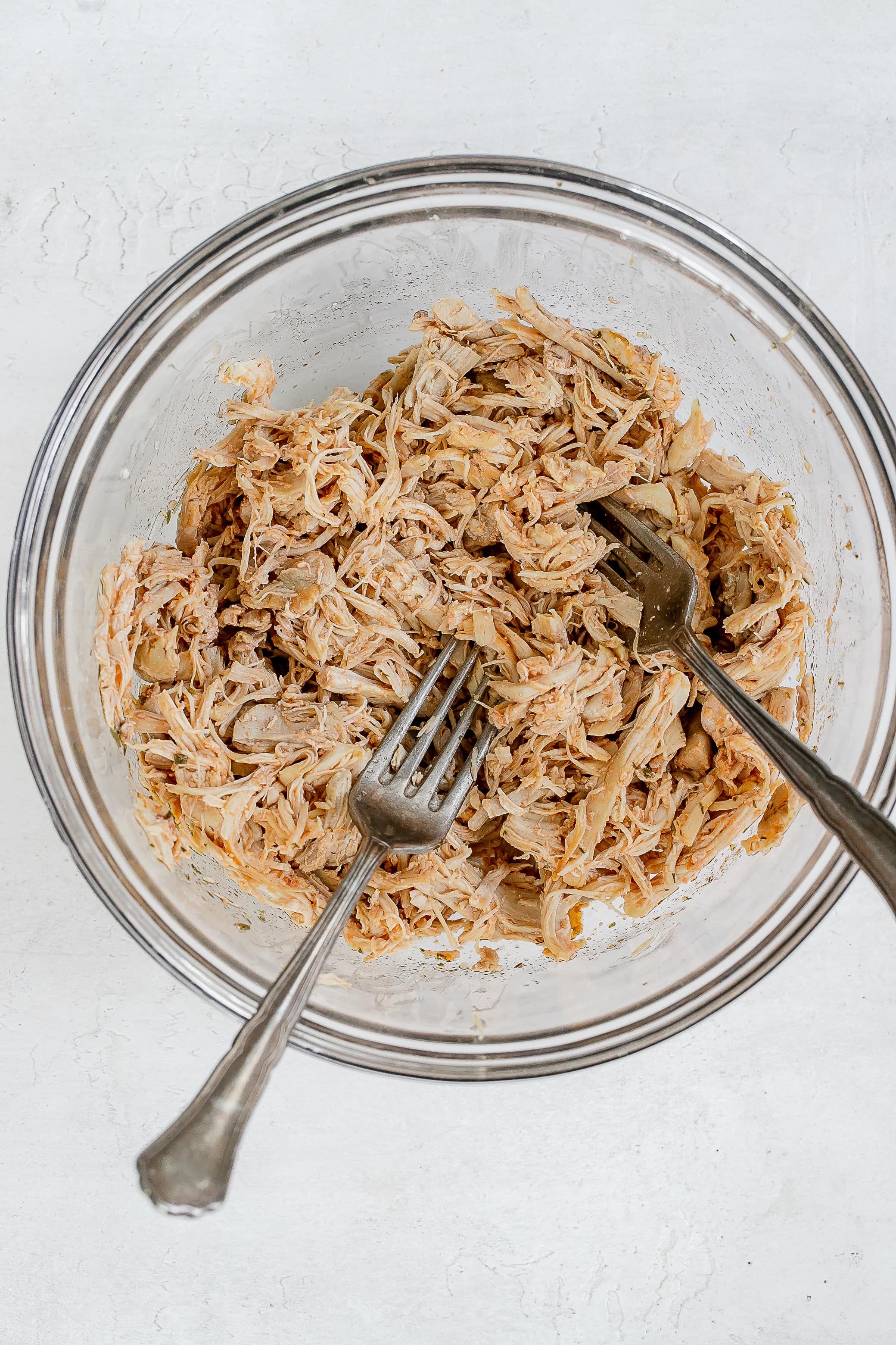 chicken shredded in bowl.