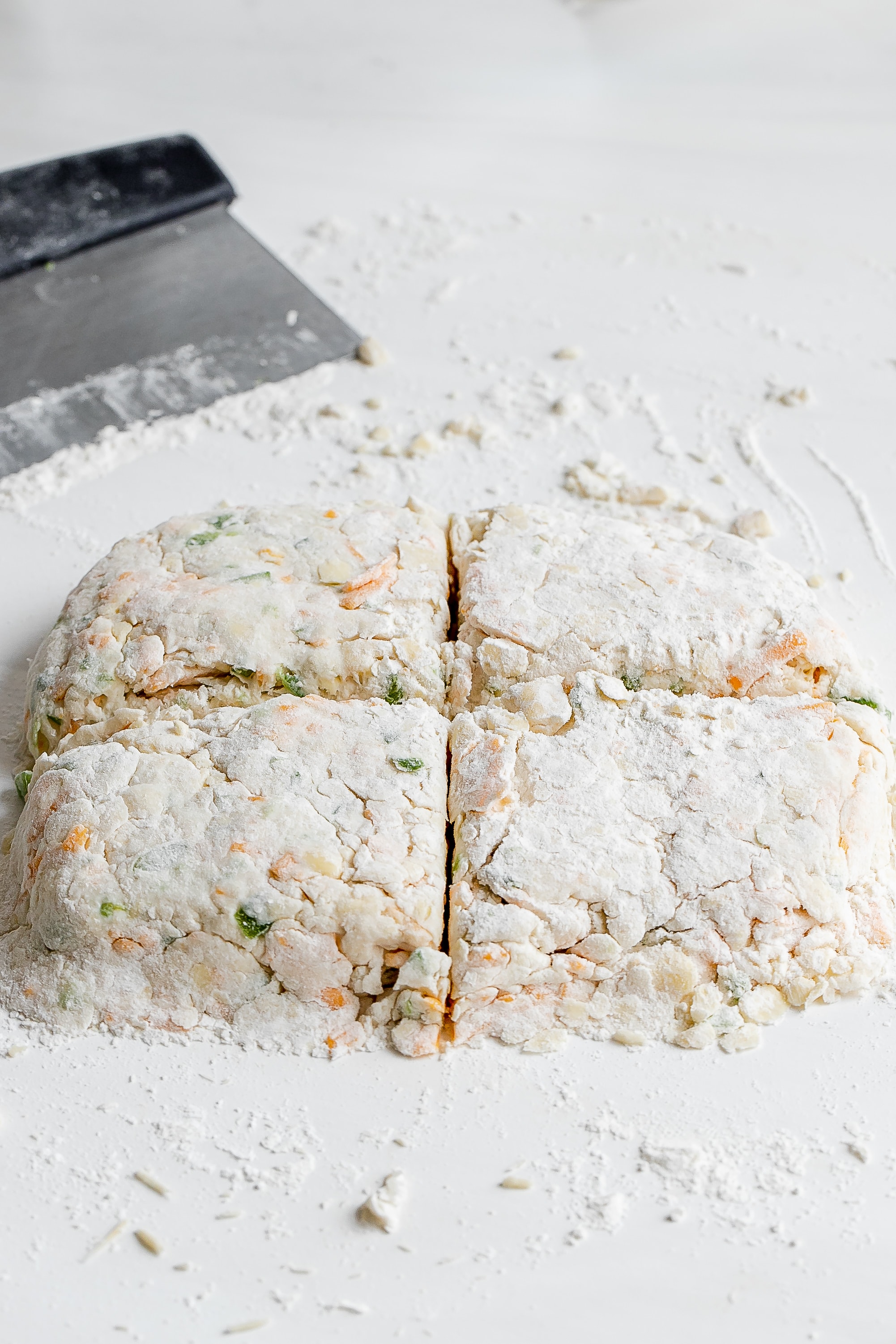 dough cut into four pieces. 