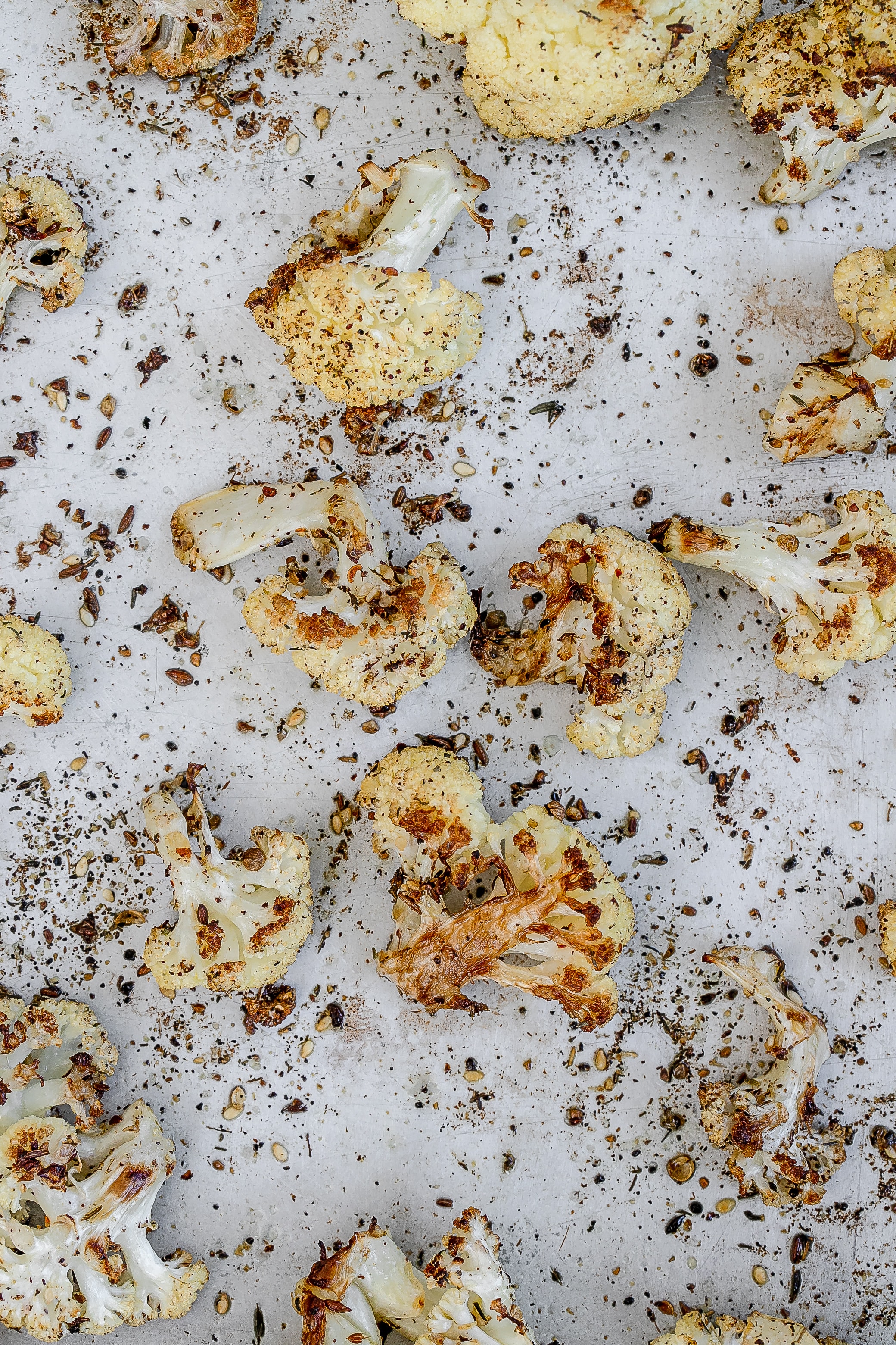 roasted cauliflower on baking sheet.