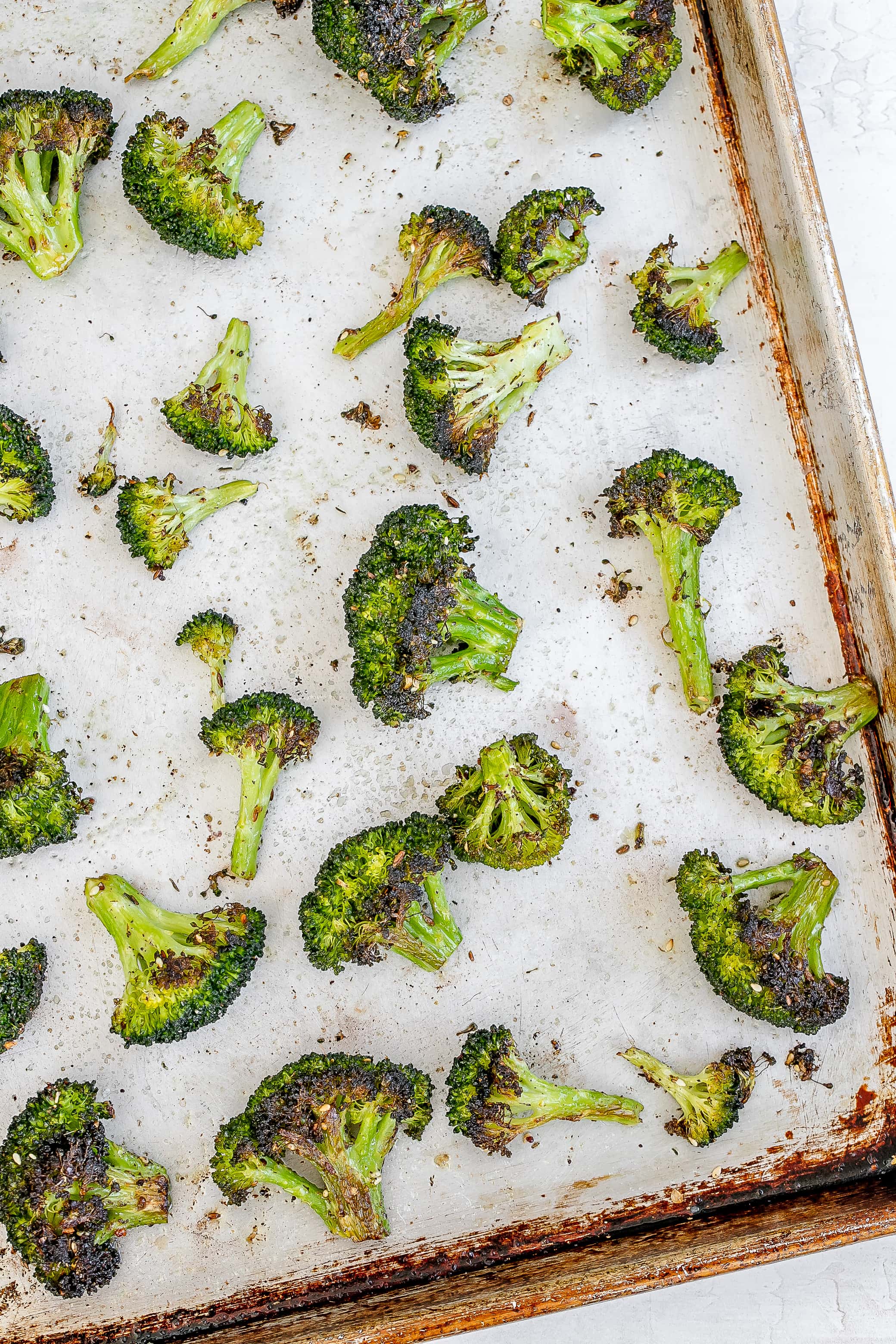 roasted broccoli on a sheet pan.