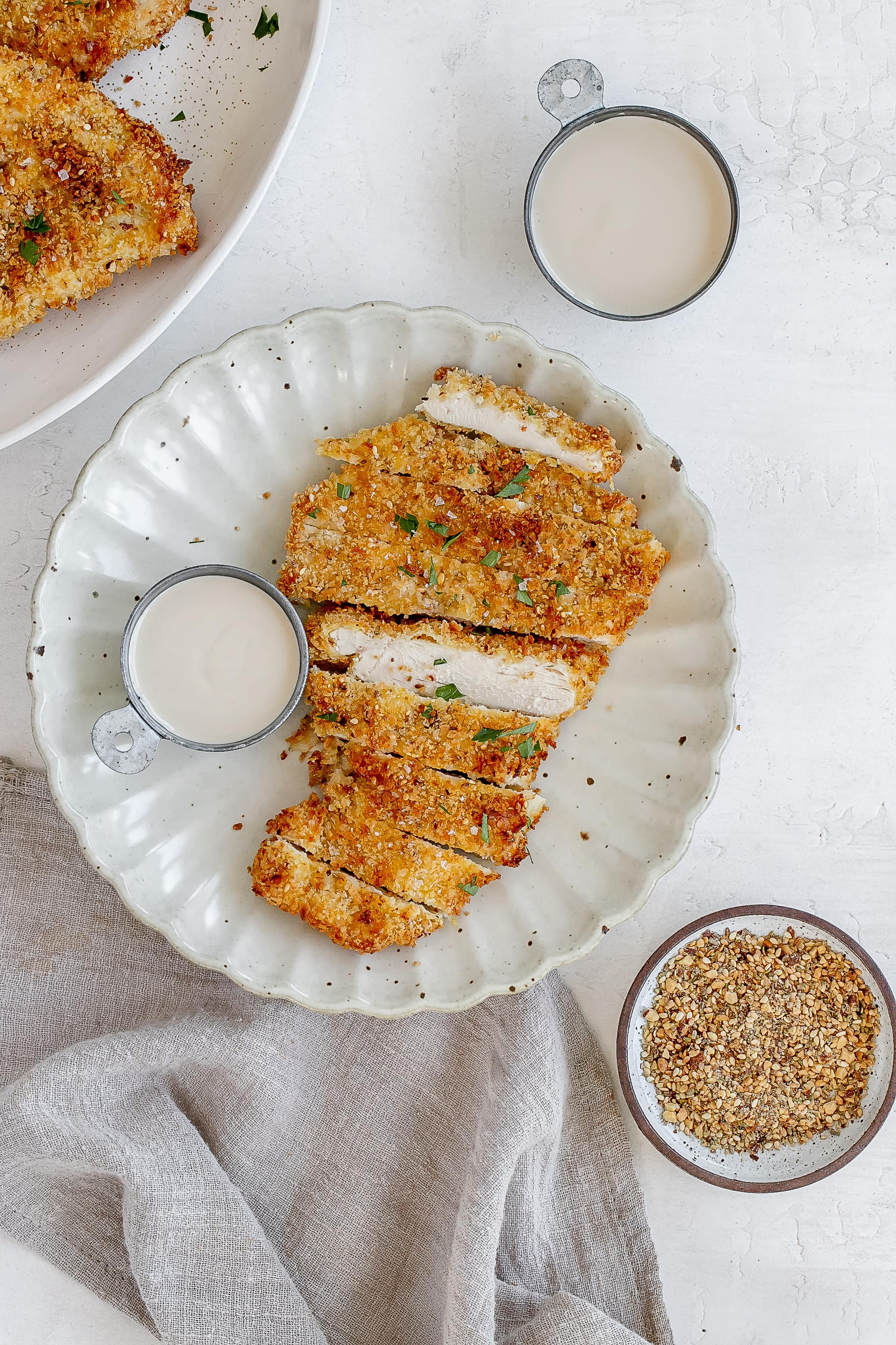 air fryer chicken schnitzel on a plate.
