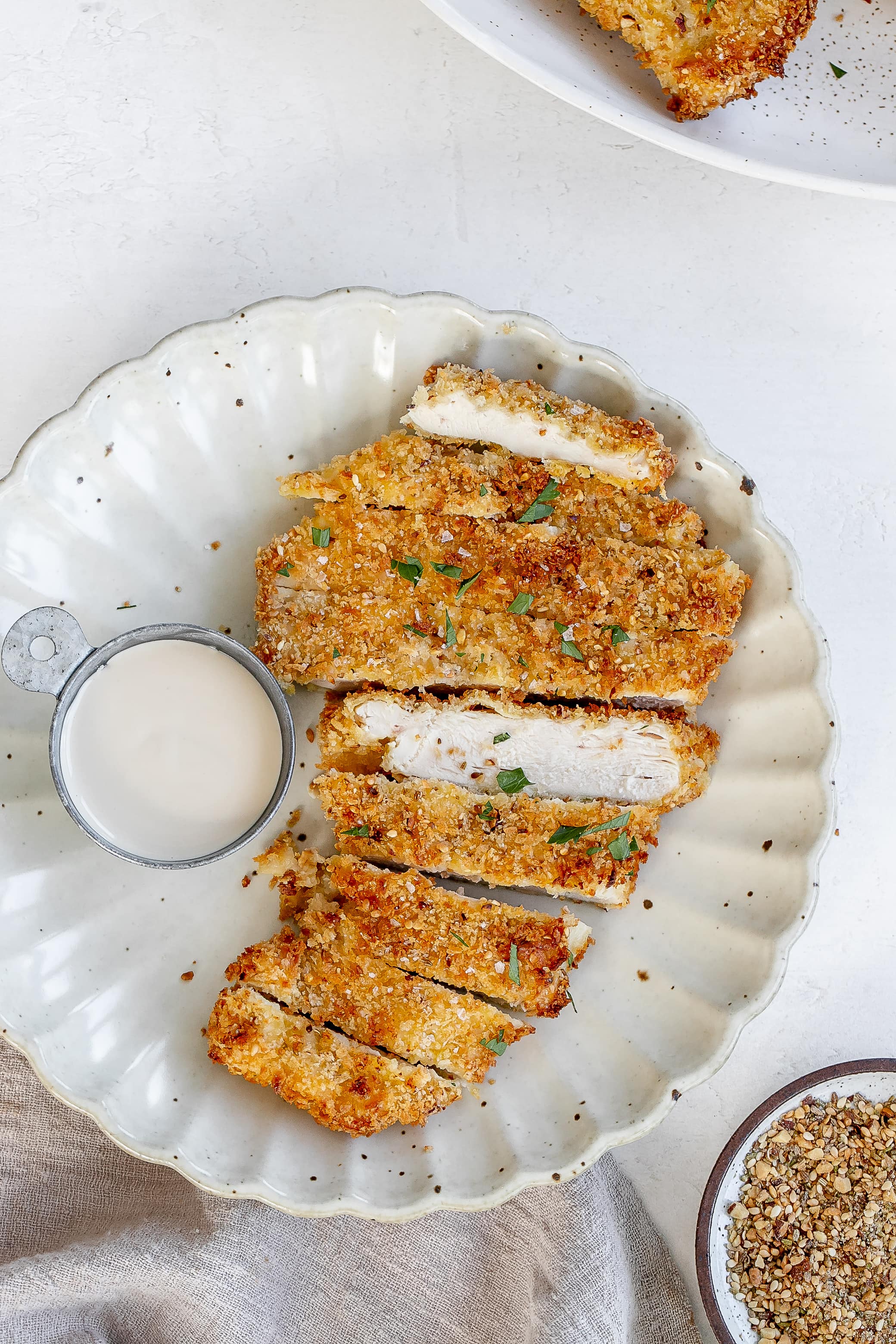 air fryer chicken schnitzel on a plate.