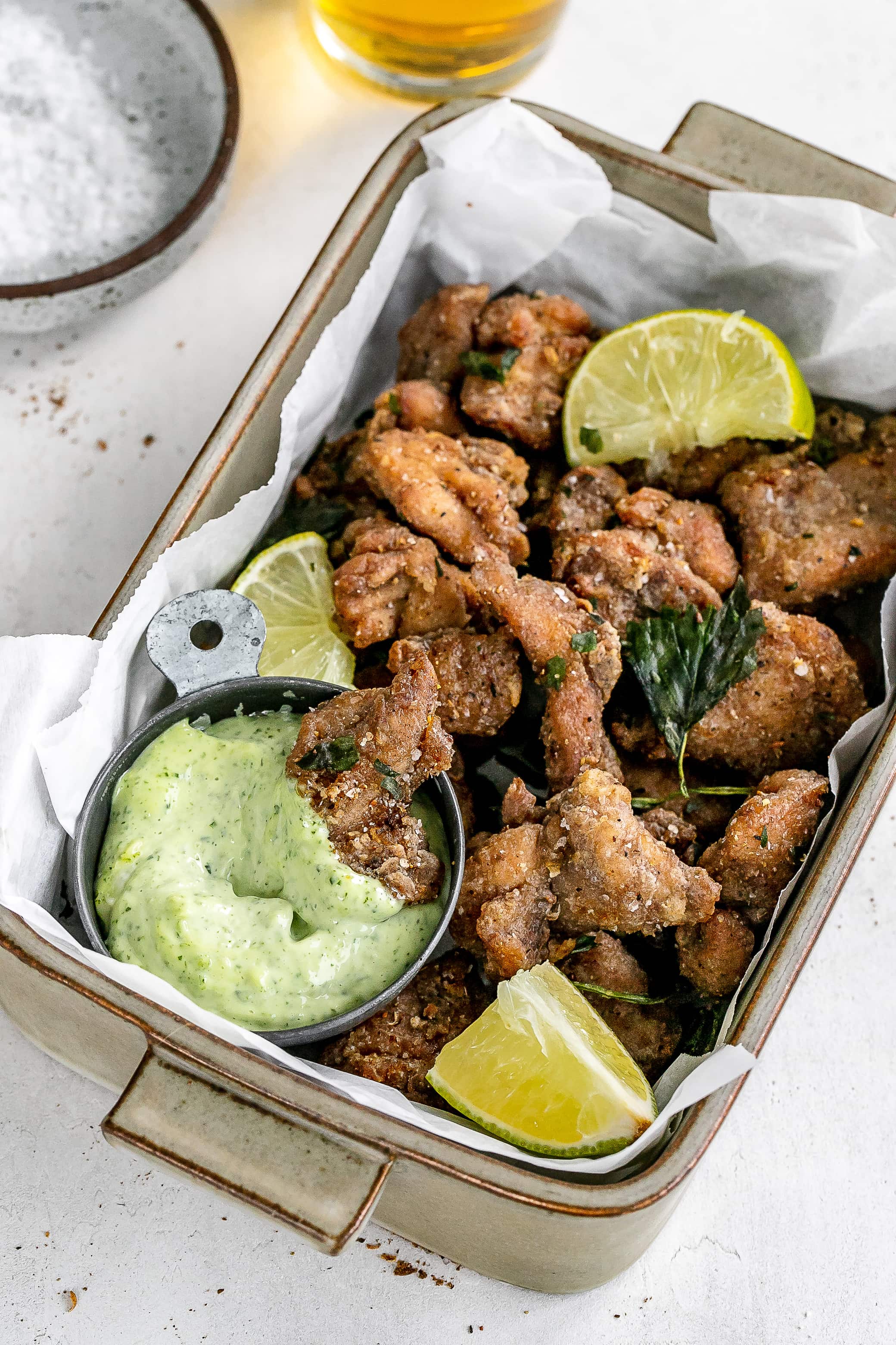Taiwanese popcorn chicken in a serving dish with a dip.