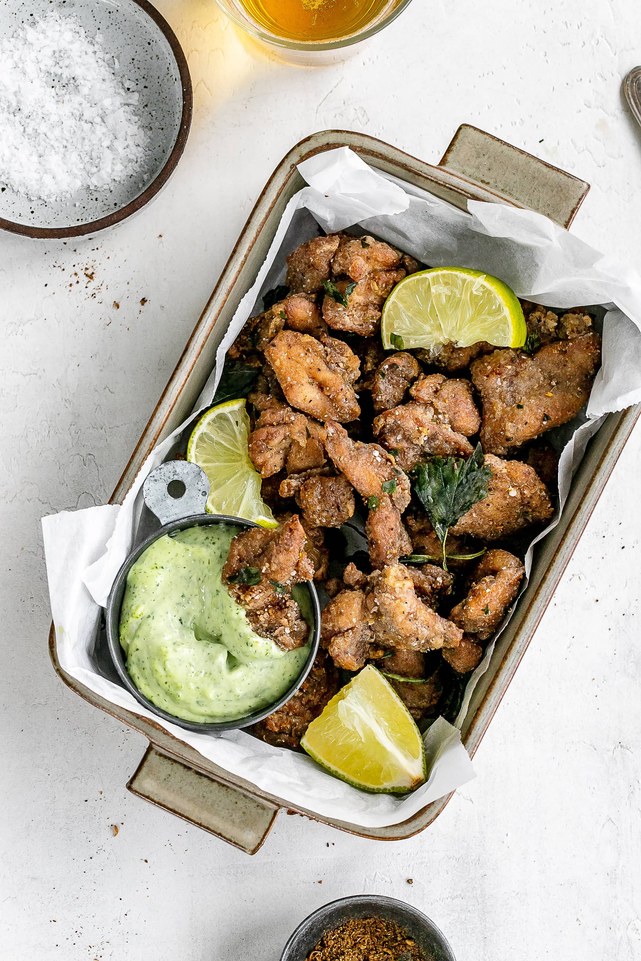 Taiwanese popcorn chicken in a serving dish with a dip.