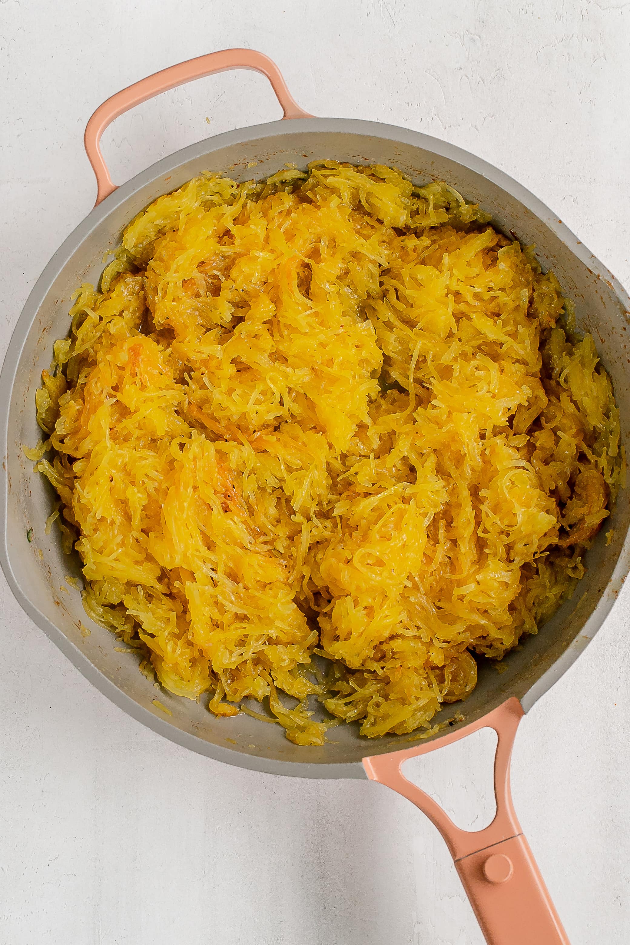 spaghetti squash in skillet with butter.  